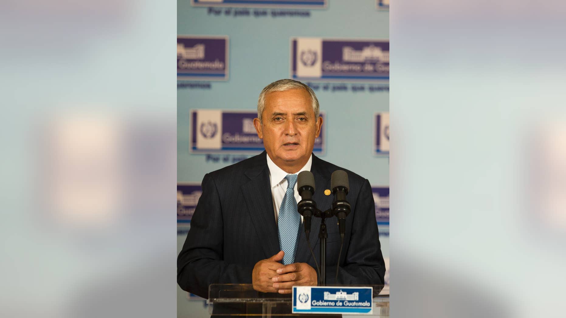 In this April 23, 2015 photo, Guatemala's President Otto Perez Molina gives a press conference at the National Palace in Guatemala City. Guatemala's Supreme Court has given the go-ahead for congress to decide whether to remove President Otto Perez Molina's immunity from prosecution in a corruption scandal. (AP Photo/Moises Castillo)