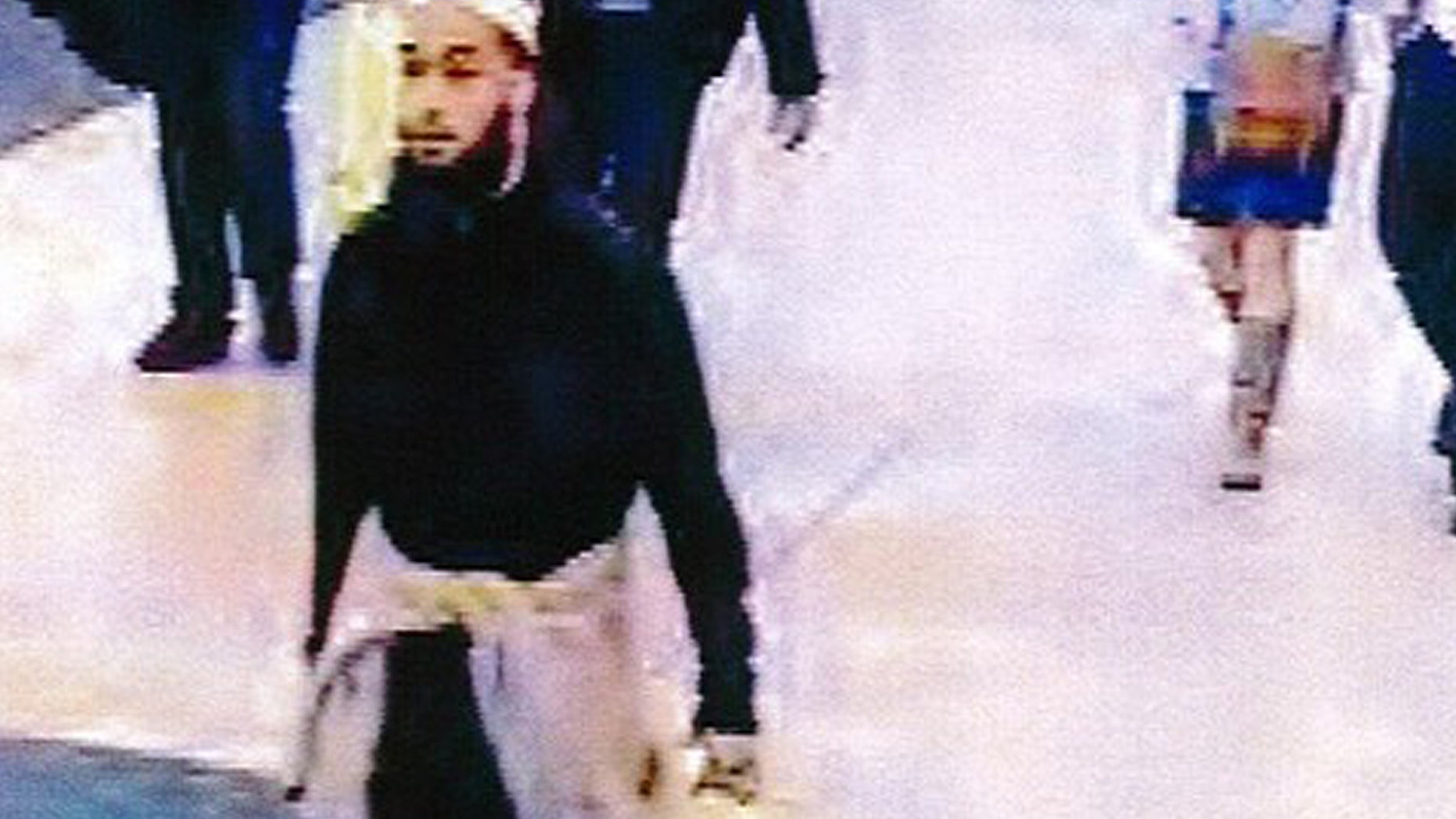 May 25, 2013 - Still image taken from a security camera, provided by French private TV station M6, shows the 22-year-old French suspect, identified only by his first name Alexandre, as he was strolling in a mall before stabbing a French soldier who was patrolling at the La Defense financial and shopping district, north of Paris, France.