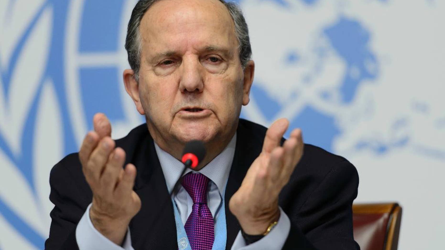 FILE - In this March 11, 2015 file photo, Juan E. Mendez, Special Rapporteur on torture and other cruel, inhuman or degrading treatment or punishment, speaks during a news conference about his annual report to the Human Rights Council at the European headquarters of the United Nations, in Geneva, Switzerland. Mendez, speaking on Wednesday, Sept. 21, 2016, has criticized a Turkish government decision to postpone his visit to the country saying the move "sends the wrong message." (Martial Trezzini, Keystone, File via AP)