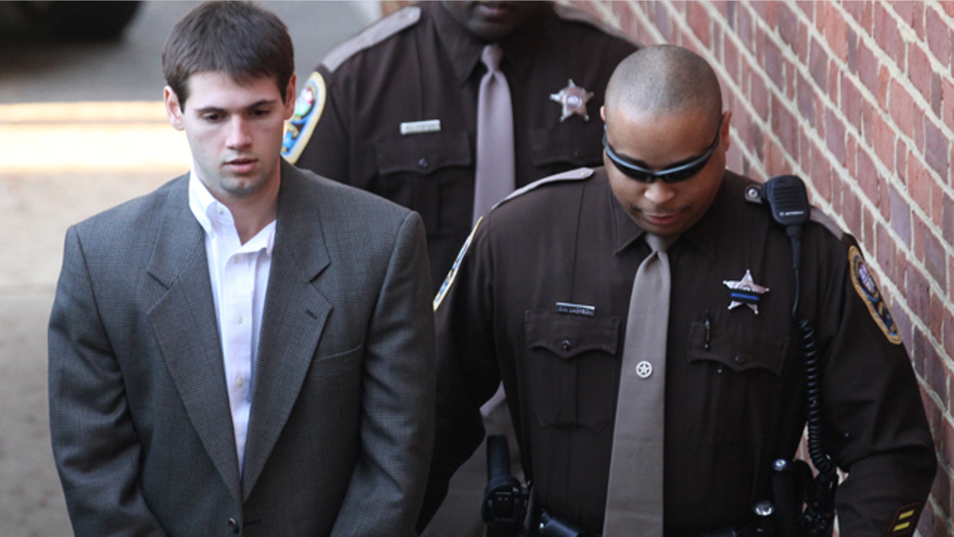 Feb. 10: George Huguely V is escorted to the Charlottesville Circuit Court.