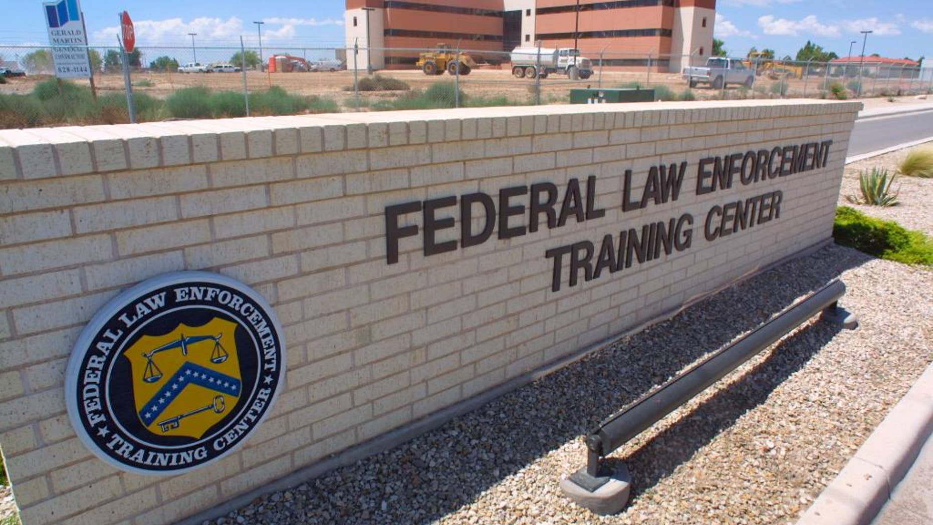FILE - In this Aug. 1, 2002 file photo, the Federal Law Enforcement Training Center in Artesia, N.M., where agents for the Federal Air Marshal Service undergo training. Incidents of unruly passengers on planes are increasing, and more effective deterrents are needed to tackle the problem, a global airline trade group said Wednesday, Sept. 28, 2016. There were 10,854 air rage incidents reported by airlines worldwide last year, up from 9,316 incidents in 2014, according to the International Air Transport Association. That equates to one incident for every 1,205 flights, an increase from one incident per 1,282 flights the previous year. (AP Photo/J.R. Hernandez, File)