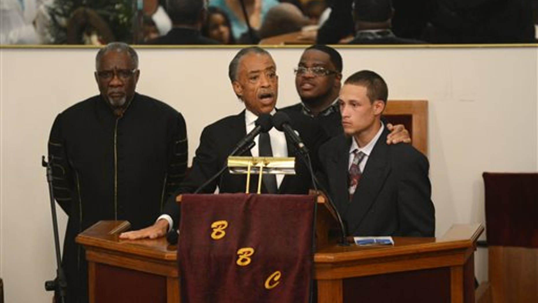 The Rev. Al Sharpton introduces Ramsey Orta at the funeral of Eric Garner at Bethel Baptist Church in the Brooklyn borough of New York on Wednesday, July 23, 2014. Garner died in police custody after an officer placed him in an apparent chokehold. Orta shot video of the incident. (AP Photo/New York Daily News, Julia Xanthos, Pool)