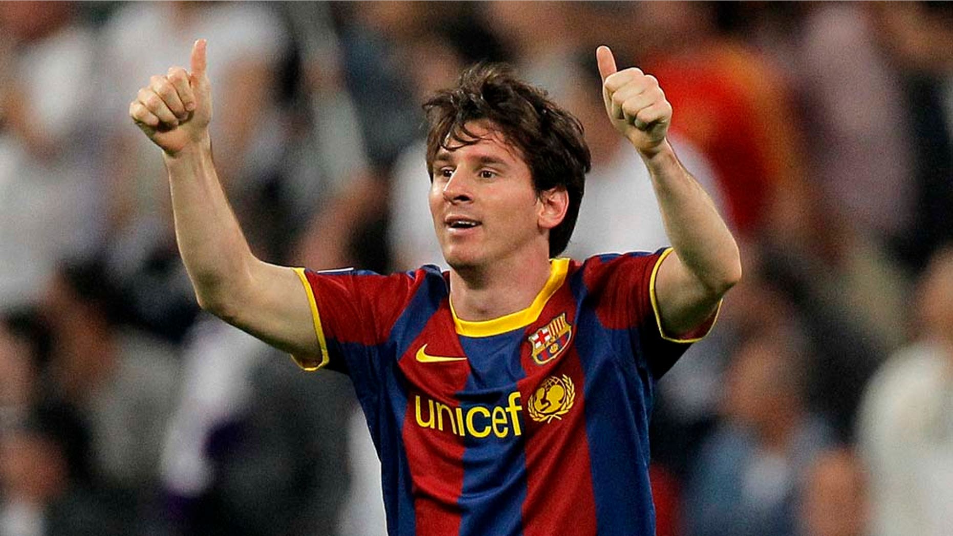 Apr 27: FC Barcelona's Lionel Messi from Argentina celebrates his goal during a semifinal, 1st leg Champions League soccer match against Real Madrid at the Santiago Bernabeu stadium in Madrid.