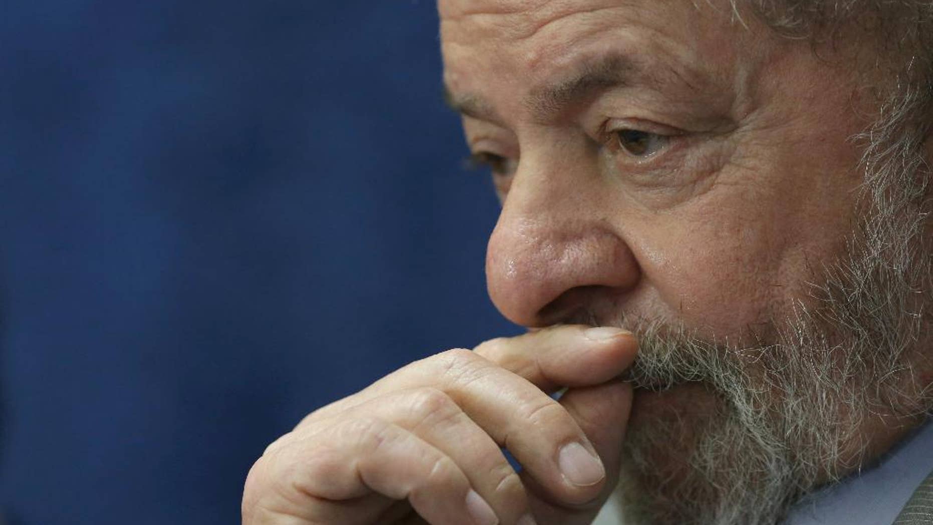FILE - In this Aug. 29, 2016 file photo, Brazil's former President Luiz Inacio Lula da Silva attends the impeachment trial of Brazil's suspended President Dilma Rousseff, in Brasilia, Brazil. On Friday, Dec. 9, 2016, prosecutors charged the former leader and his son with corruption in a case involving the purchase of 36 Swedish fighter jets by the South American nation. (AP Photo/Eraldo Peres, File)
