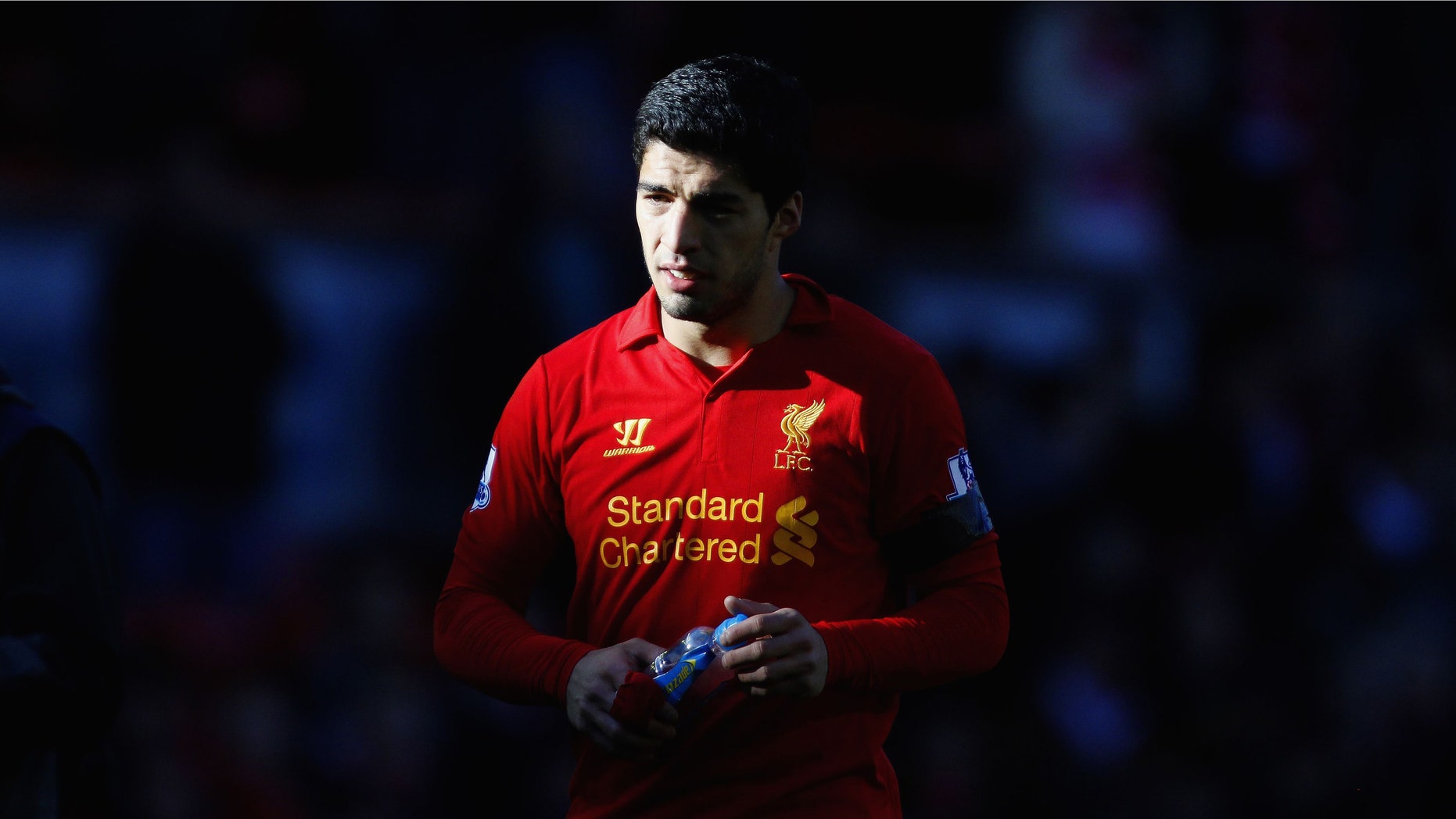 Liverpool's Luis Suarez is seen during his team's 2-2 draw against Chelsea in their English Premier League soccer match at Anfield Stadium, Liverpool, England, Sunday April 21, 2013. (AP/PA, Peter Byrne)