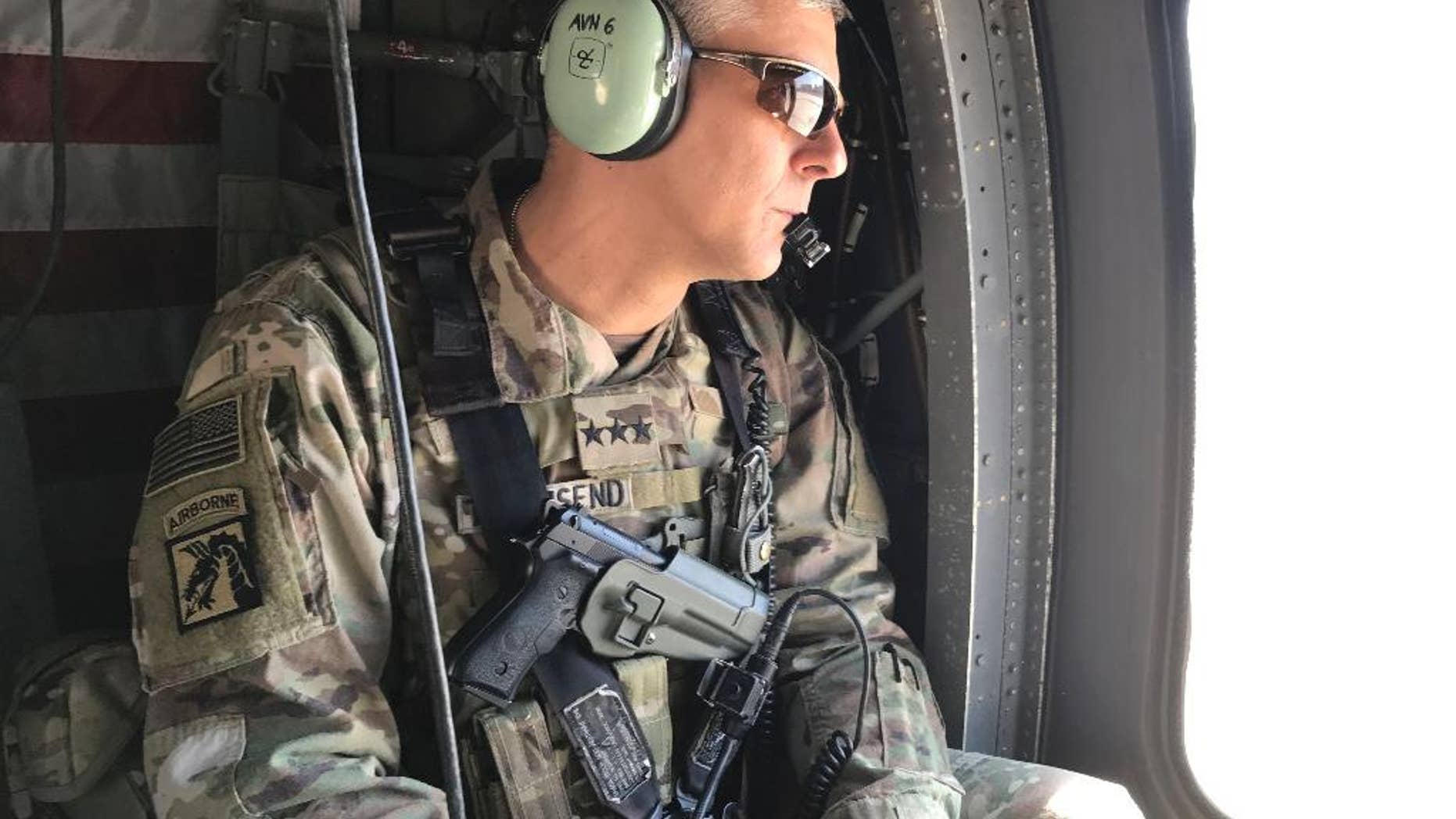 FILE - In this Feb. 8, 2017 file photo, U.S. Army Lt. Gen. Stephen Townsend watches during a tour north of Baghdad, Iraq. A Russian airstrike in northern Syria hit U.S.-backed Syrian Arab forces who are part of the fight against the Islamic State group, Townsend said Wednesday, March 1, 2017. (AP Photo/ Ali Abdul Hassan, File)