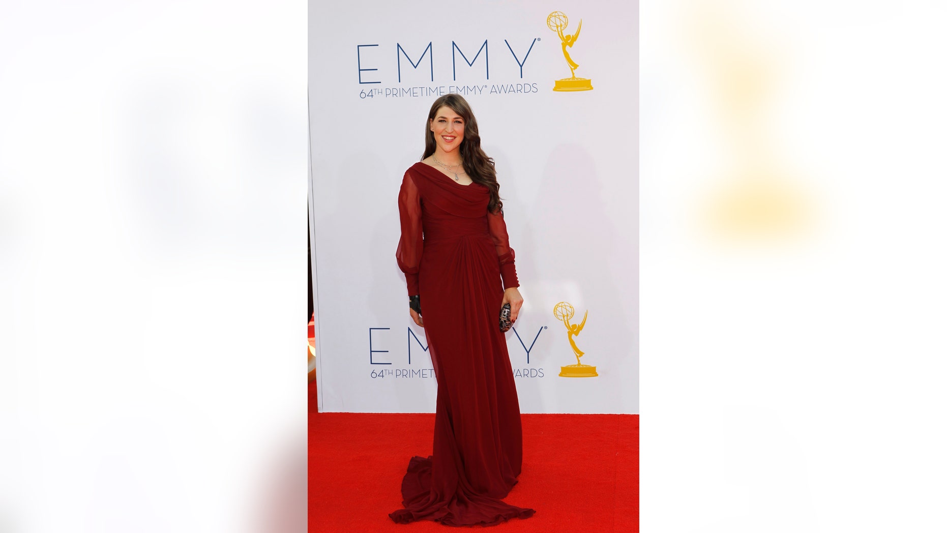 Actress Mayim Bialik, from the television program"Big Bang Theory" arrives at the 64th Primetime Emmy Awards in Los Angeles, September 23, 2012. REUTERS