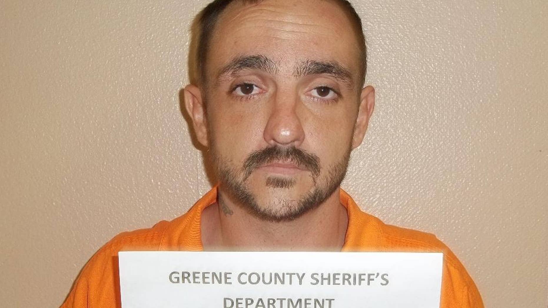 A photo provided by the Greene County Sheriff's Department shows Derrick Dearman, a suspect in the Saturday massacre of five adults in Citronelle Ala. Dearman, of Leakesville, Mississippi, will be charged with six counts of capital murder, Mobile County sheriff's spokeswoman Lori Myles said Sunday, Aug. 21, 2016. (George County Sheriff's Department via AP)