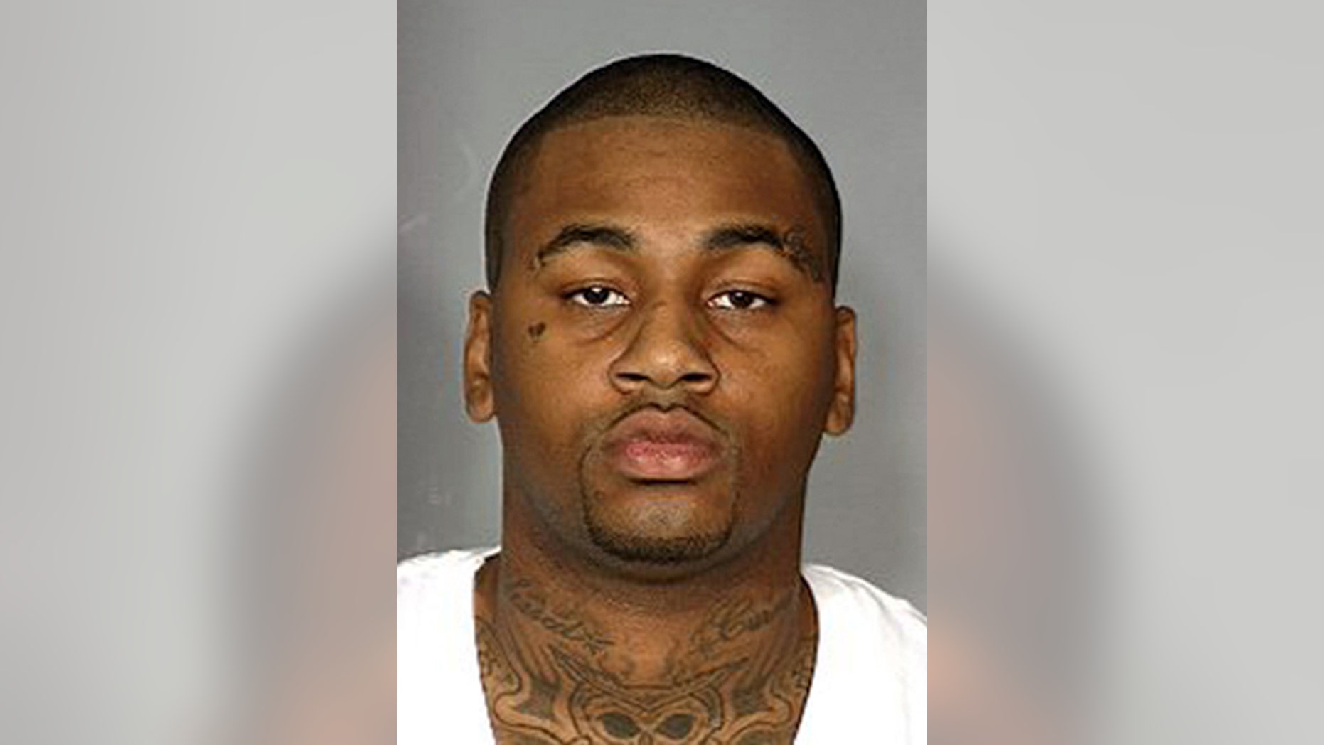 FILE - This image provided by the Las Vegas Metropolitan Police Department shows Ammar Harris in a booking photo from a 2012 arrest in Las Vegas. Harris, a self-described pimp has been indicted on charges that could bring the death penalty in a fatal shooting and fiery crash that killed three people on the Las Vegas Strip. The Clark County District Court grand jury also handed up a surprise indictment Friday April 26, 2013, against 27-year-old Harris. It stems from a 2010 case and charges him with robbery and felony sex assault. (AP Photo/Las Vegas Metropolitan Police Department, File)