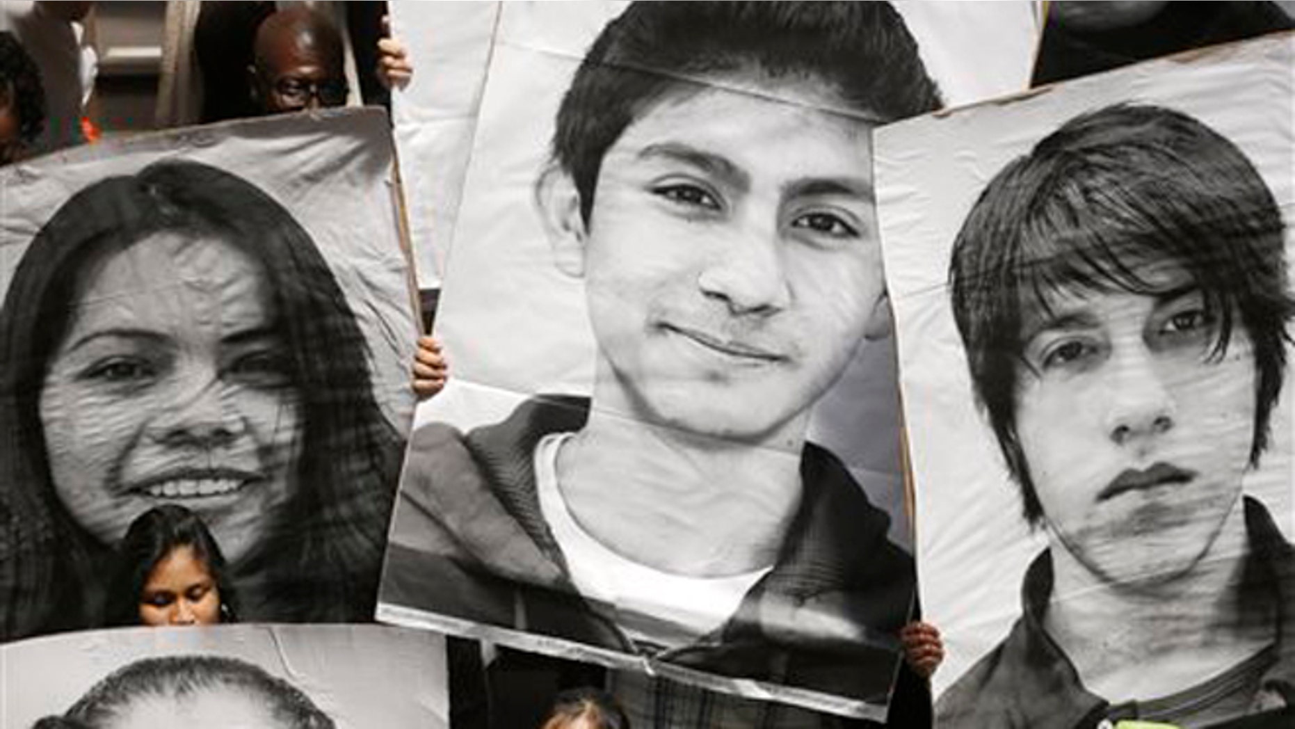 FILE--In this May 21, 2013 file photo, supporters of the New York DREAM Act hold photos of undocumented students who are not eligible for college tuition assistance during a rally at the Capitol in Albany, N.Y. Supporters of the bill that would give undocumented immigrant students in New York access to state tuition assistance werenât giving it much of a chance in this election year, planning instead for a push in 2015. But unforeseen support from New York City Mayor Bill de Blasio and more Democratic lawmakers has breathed new life into the stateâs proposed âDream Actâ and given hope to immigrant students who would otherwise be shut out of state financial aid. (AP Photo/Mike Groll, File)