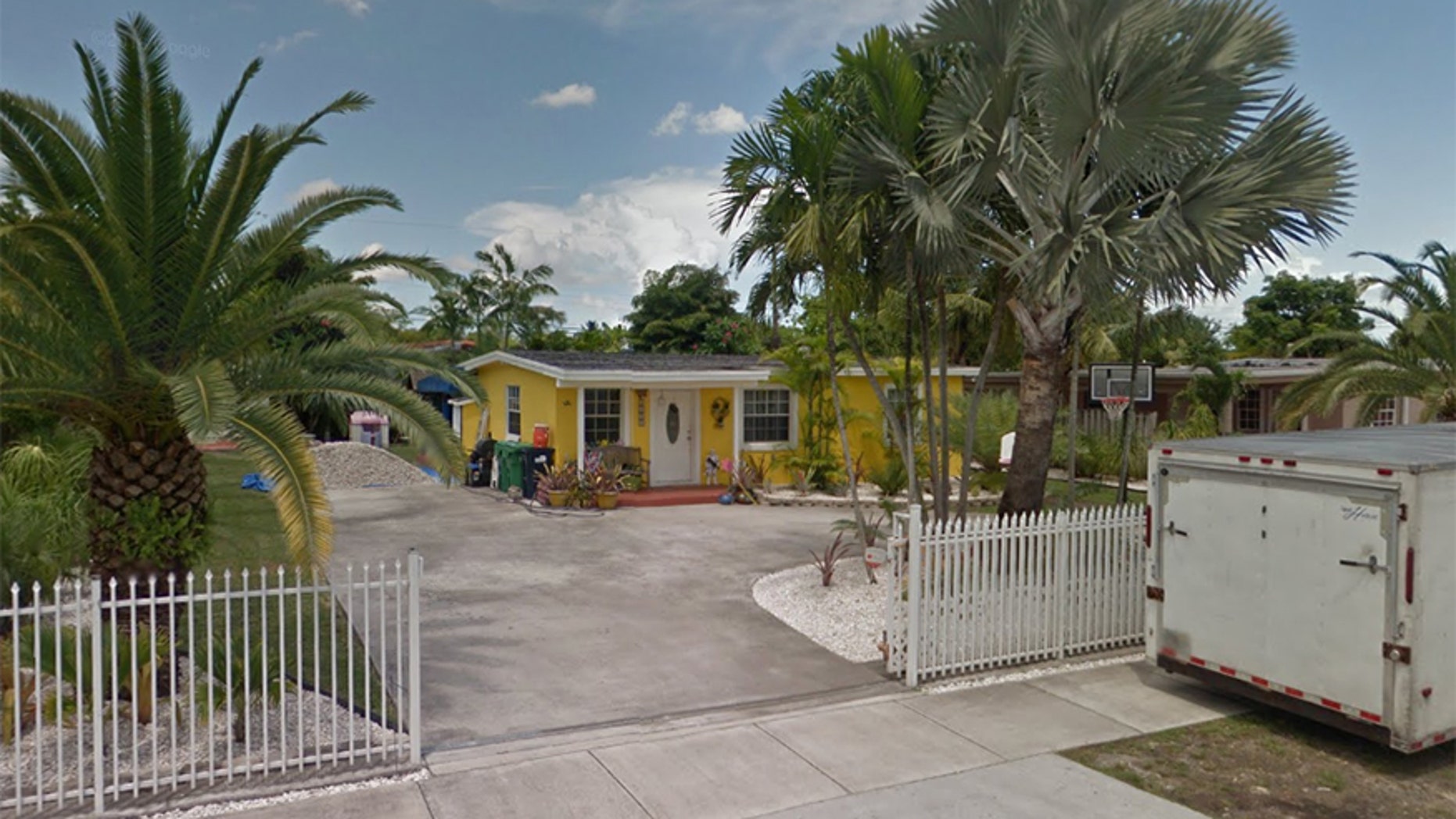 A 7-year-old girl was bit by her dog outside this home in Miami-Dade county.