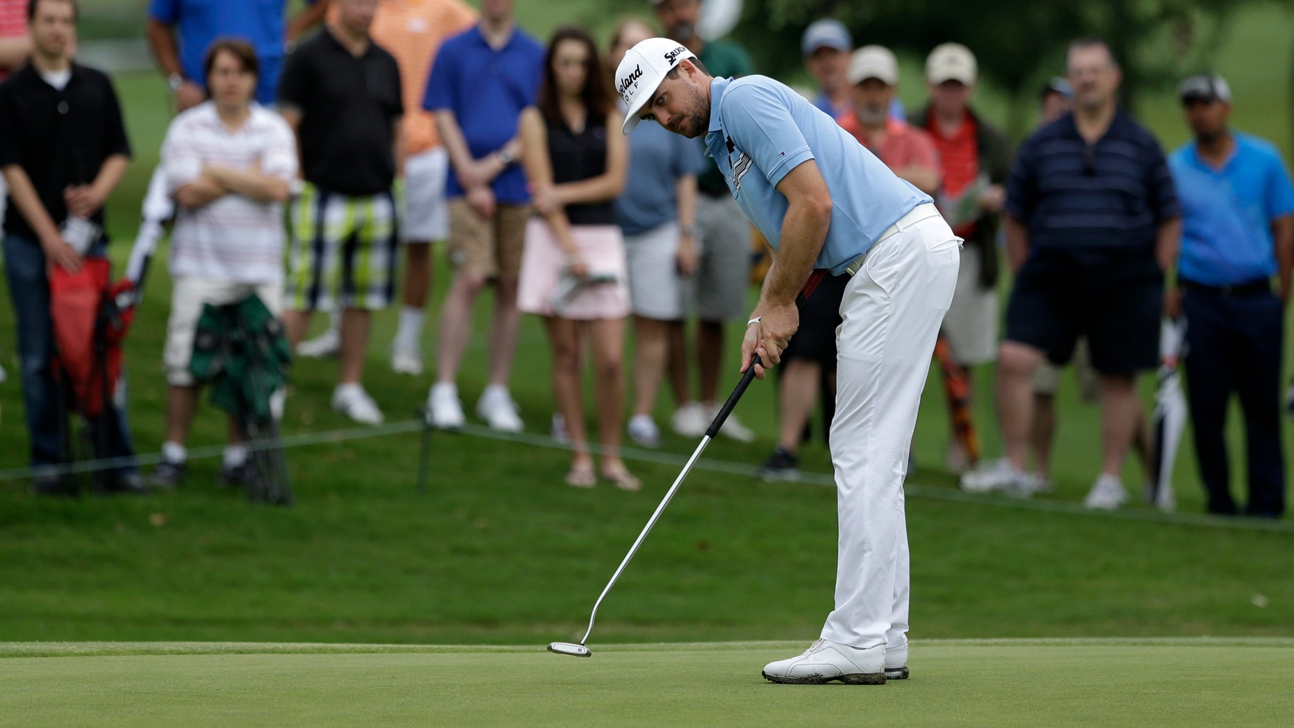 Keegan Bradley watches his birdie putt on the second green during the first round of the Byron Nelson Championship golf tournament Thursday, May 16, 2013, in Irving, Texas. Bradley finished the day with course record 10-under par 60. (AP Photo/Tony Gutierrez)