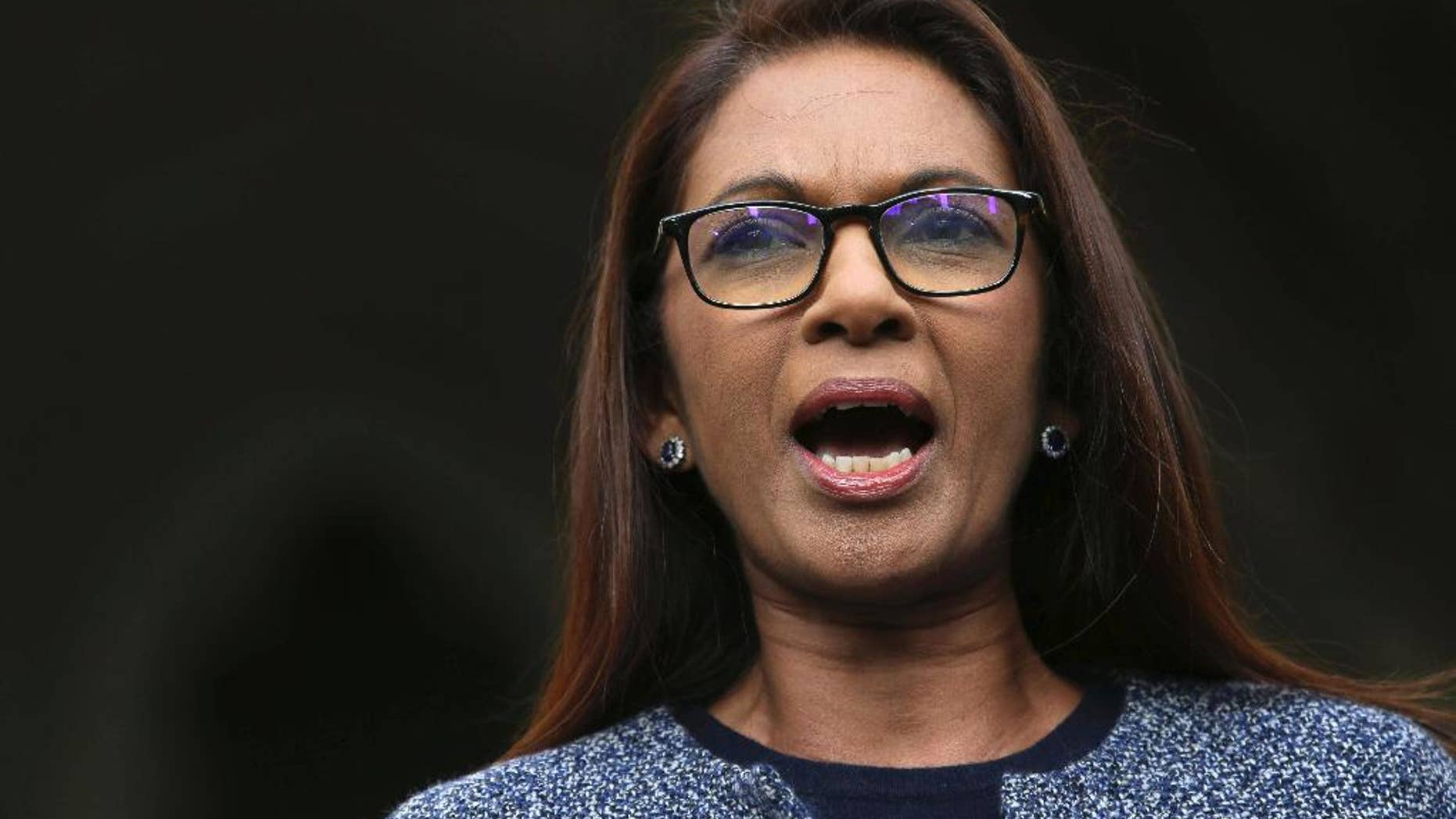 Business woman Gina Miller, one of the claimants who challenged plans for Brexit, speaks to the media outside the High Court in London, Thursday Nov. 3, 2016. In a major blow for Britain's government, the High Court ruled Thursday that the prime minister can't trigger the U.K.'s exit from the European Union without approval from Parliament. (AP Photo/Tim Ireland)