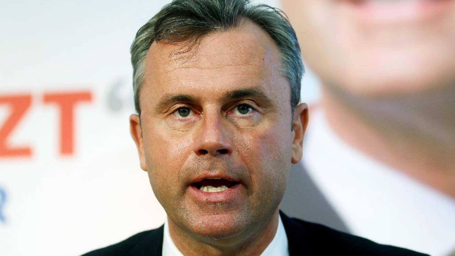 FILE - In this Monday, March 14, 2016 file photo, Norbert Hofer, candidate for Sunday's presidential elections of Austria's Freedom Party, FPOE, speaks during a news conference in Vienna, Austria. Even before a vehemently anti-EU party won strong support in Austria, the European Union’s top official acknowledged that the 28-nation bloc was in trouble. “We are facing very tough times,” European Commission President Jean-Claude Juncker told parliamentarians this month. “We are not very popular when we advocate for Europe.”Those comments were reinforced just days later with the victory Sunday of an anti-EU right-wing party in the first round of Austria’s presidential election. (AP Photo/Ronald Zak, File)