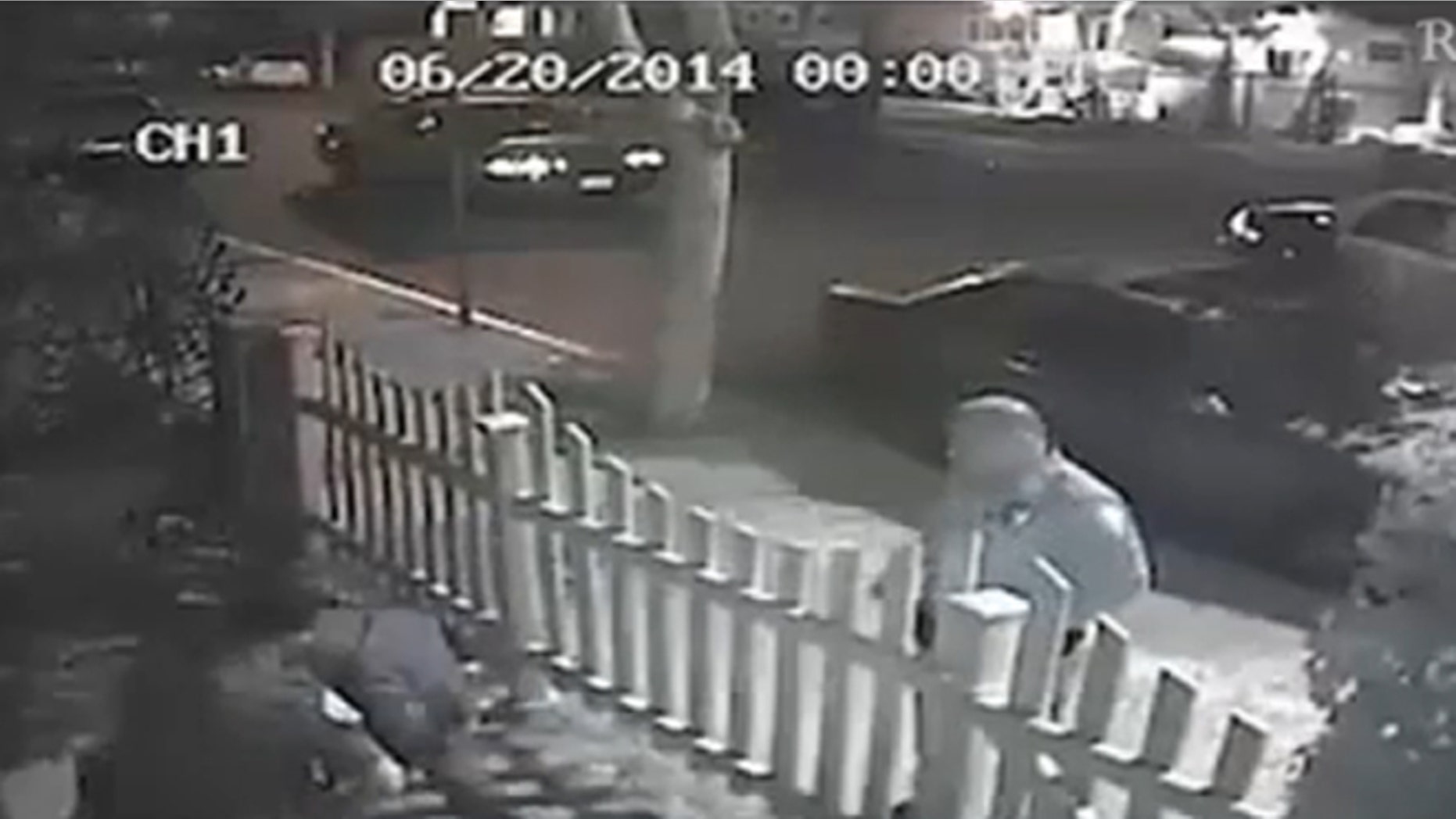 A screenshot from the video that shows Santa Ana, California police arresting Edgar Arzate.