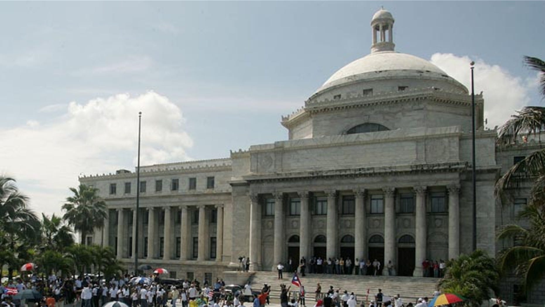 SAN JUAN, PUERTO RICO - APRIL 28: (PUERTO RICO OUT) Tens of thousands march towards the Capitol building April 28, 2006 in San Juan, Puerto Rico, demanding the legislature to approve a line of credit that would avoid the goverment from shutting down May 1, 2006 affecting over 200,000 public employees. The demonstration was called "Puerto Rico Grita" or "Scream Puerto Rico". (Photo by Jose Jimenez-Tirado/Getty Images)