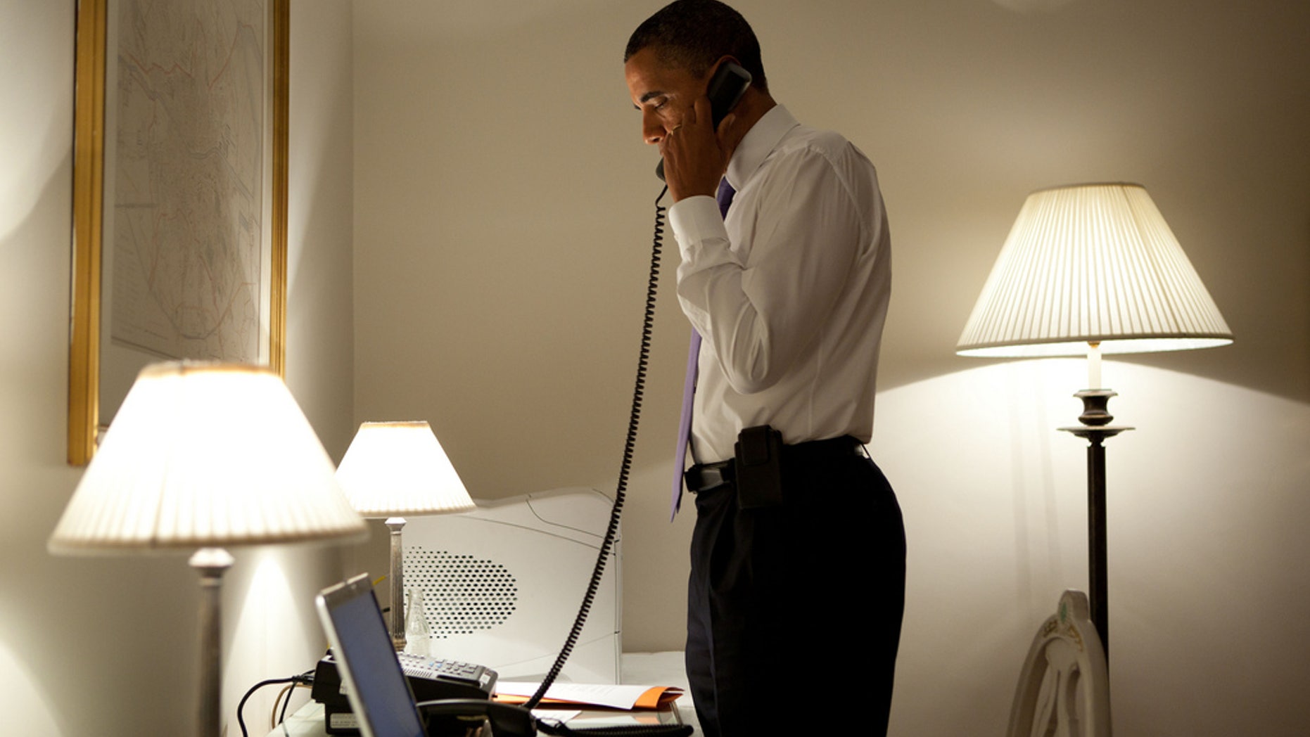 President Obama speaks with Missouri Governor Jay Nixon on the phone during Obama's visit to Dublin, Ireland, about the deadly tornado that hit Joplin, MO late Sunday. (White House Photo/Pete Souza)