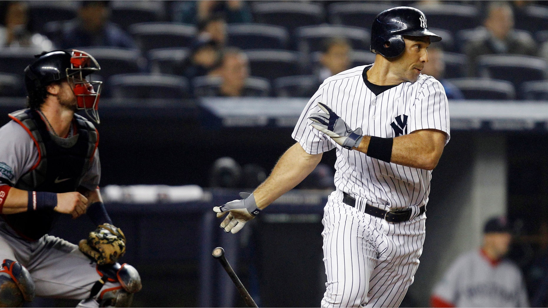 New York Yankees' Raul Ibanez watches his 12th inning, walk-off RBI single that lifted the Yankees to a 4-3 victory over the Boston Red Sox in their baseball game at Yankee Stadium in New York, Tuesday, Oct. 2, 2012. (AP Photo/Kathy Willens)