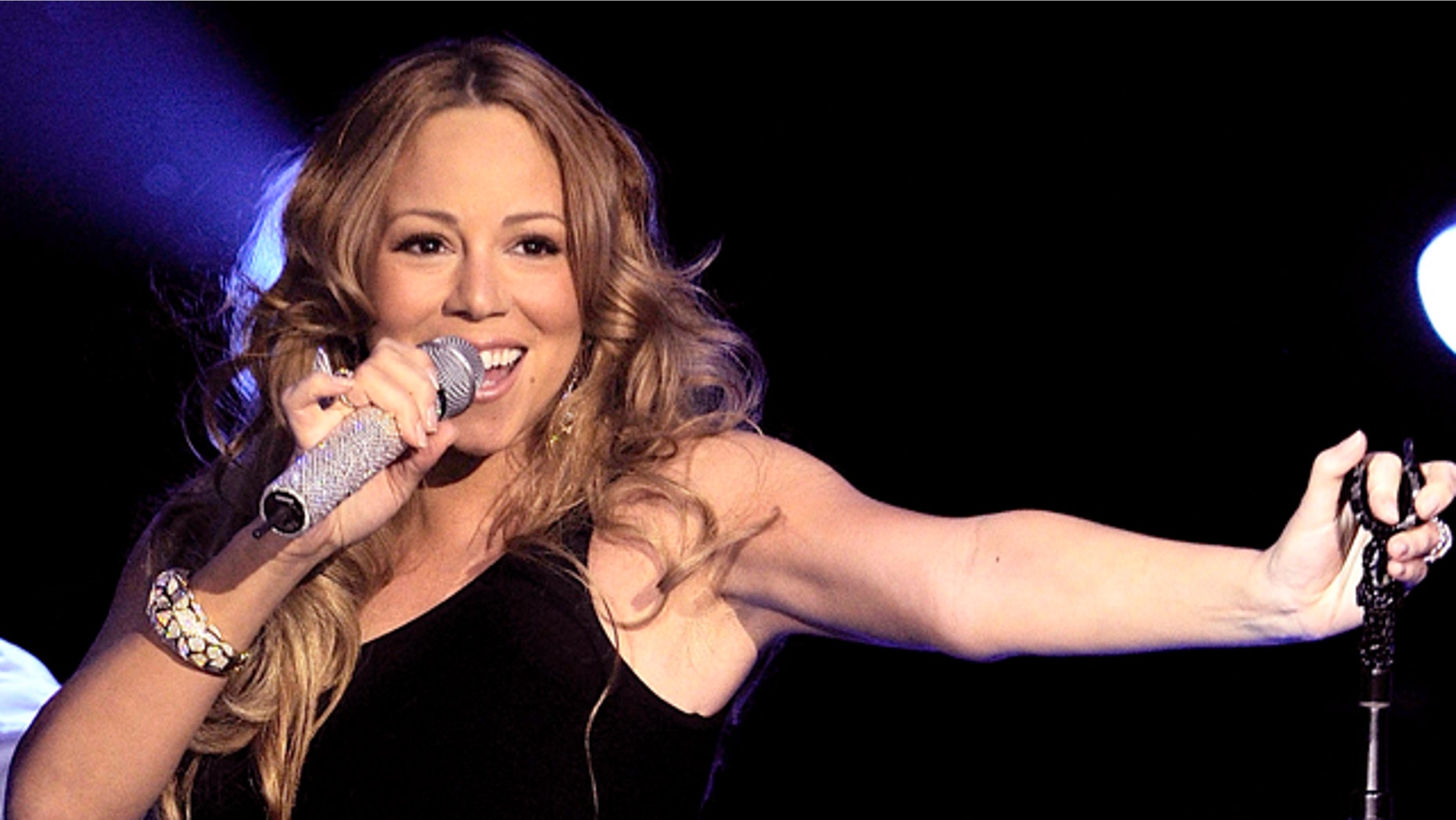 NEW YORK, NY - MARCH 01: Mariah Carey performs during Escape To Total Rewards at Gotham Hall on March 1, 2012 in New York City. (Photo by Larry Busacca/Getty Images for Caesars Entertainment)