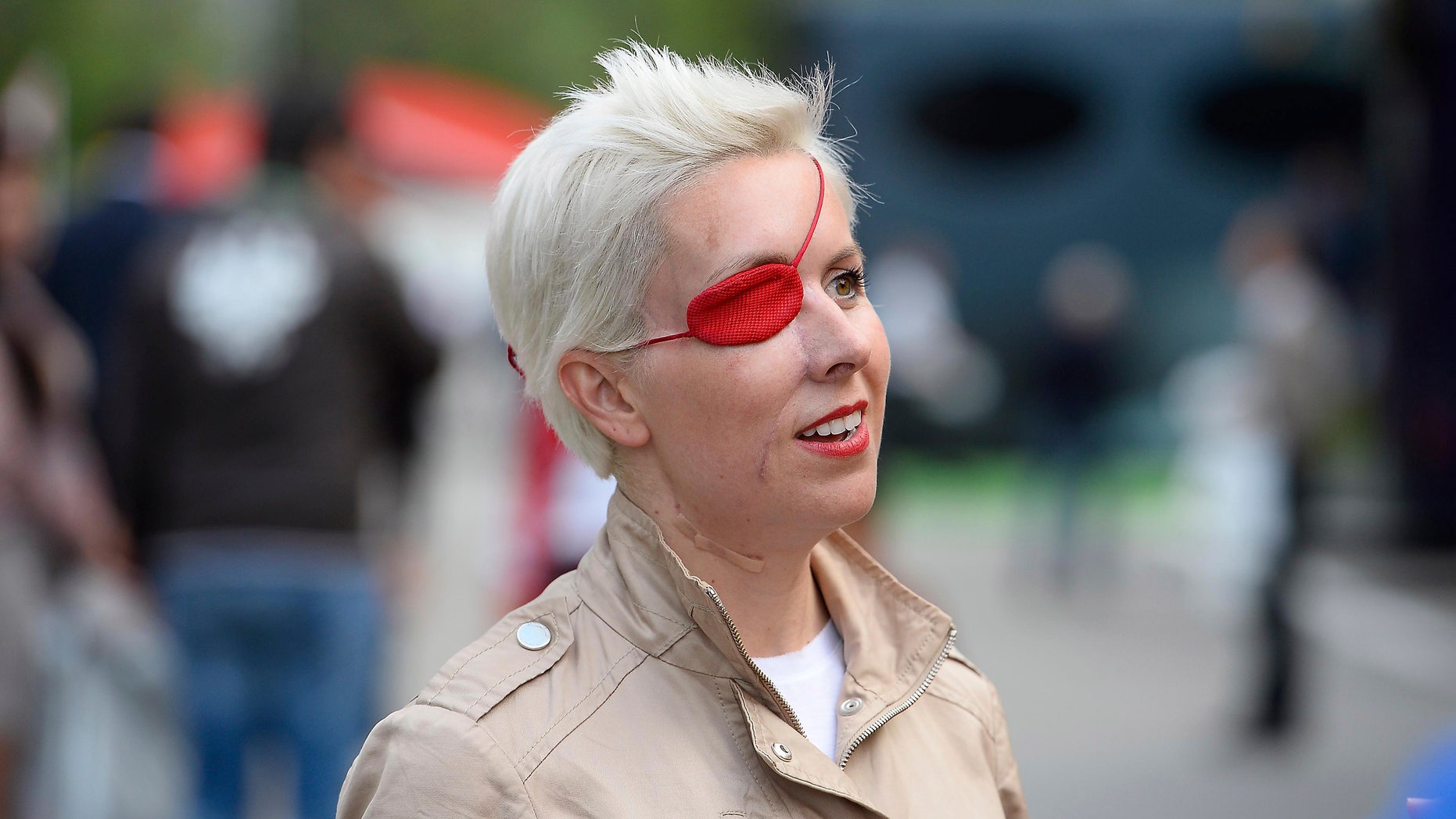 Spanish former F1 driver Maria De Villota is seen in the paddock after the second free practice session at the Catalunya racetrack in Montmelo, near Barcelona, Spain, Friday, May 10, 2013. Maria de Villota, a Spaniard who drove for Marussia, was the series' last full-time female driver since Italy's Giovanna Amati was with the Brabham team in 1992. But de Villota's career ended prematurely in July when she crashed into a team support vehicle in her first test of the team's MR-01 car. She lost her right eye in the accident and has not returned. (AP Photo)