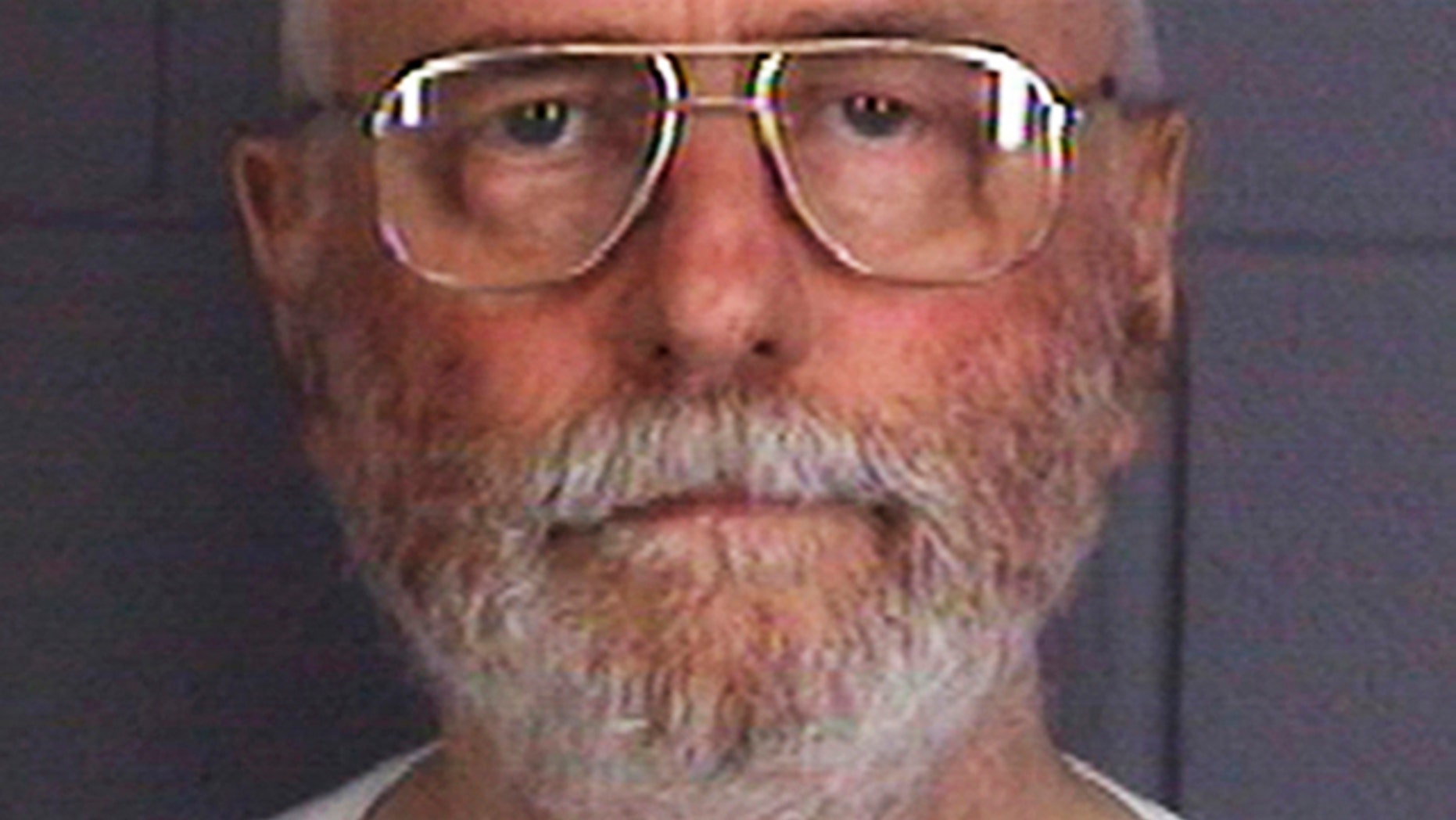 July 27, 2011: This file photo provided by the DeKalb County Sheriff's Department in Sycamore, Ill., shows Jack McCullough, of Seattle.