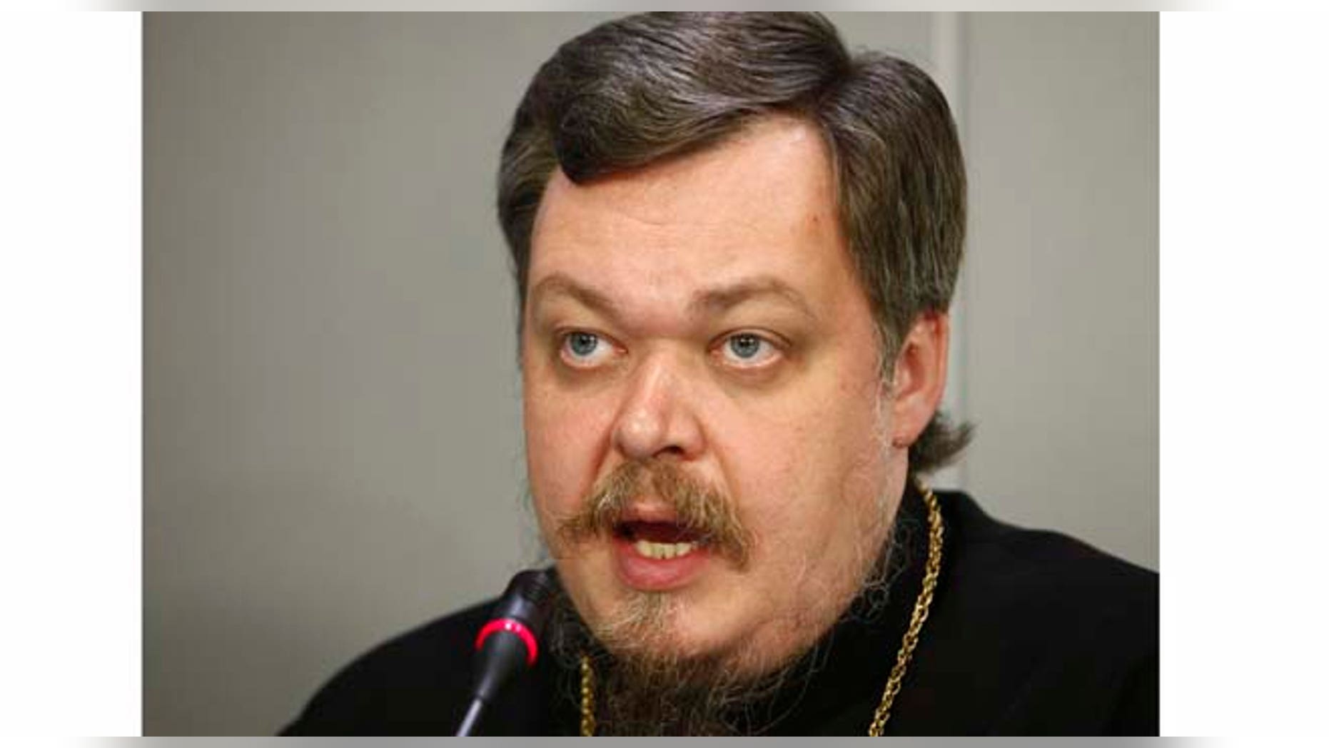 FILE - In this Monday, May 30, 2011 file photo, Russian Orthodox Church spokesman Father Vsevolod Chaplin speaks at a news conference on proposed legislation to curb abortion rates in Russia, in Moscow. Father Vsevolod Chaplin called on authorities Wednesday Sept. 28, 2011 to investigate and ban novels by Vladimir Nabokov and Gabriel Garcia Marquez for "justifying pedophilia." (AP Photo/Alexander Zemlianichenko, File)