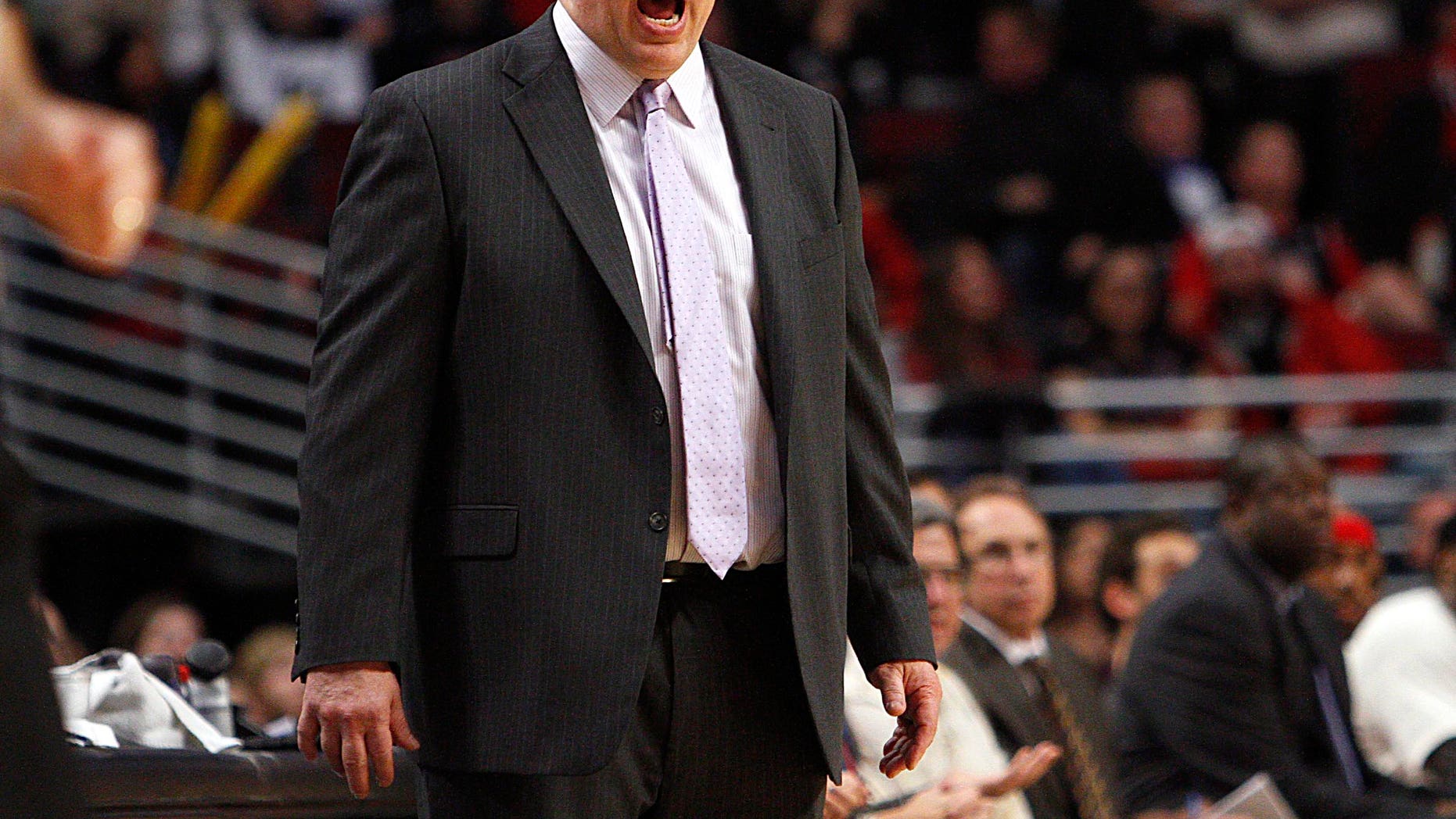 Chicago Bulls head coach Tom Thibodeau shouts out a play against the Toronto Raptors as the Raptors beat the Bulls 101-98 in an NBA basketball game on Tuesday, April 9, 2013 in Chicago. (AP Photo/Charles Cherney)
