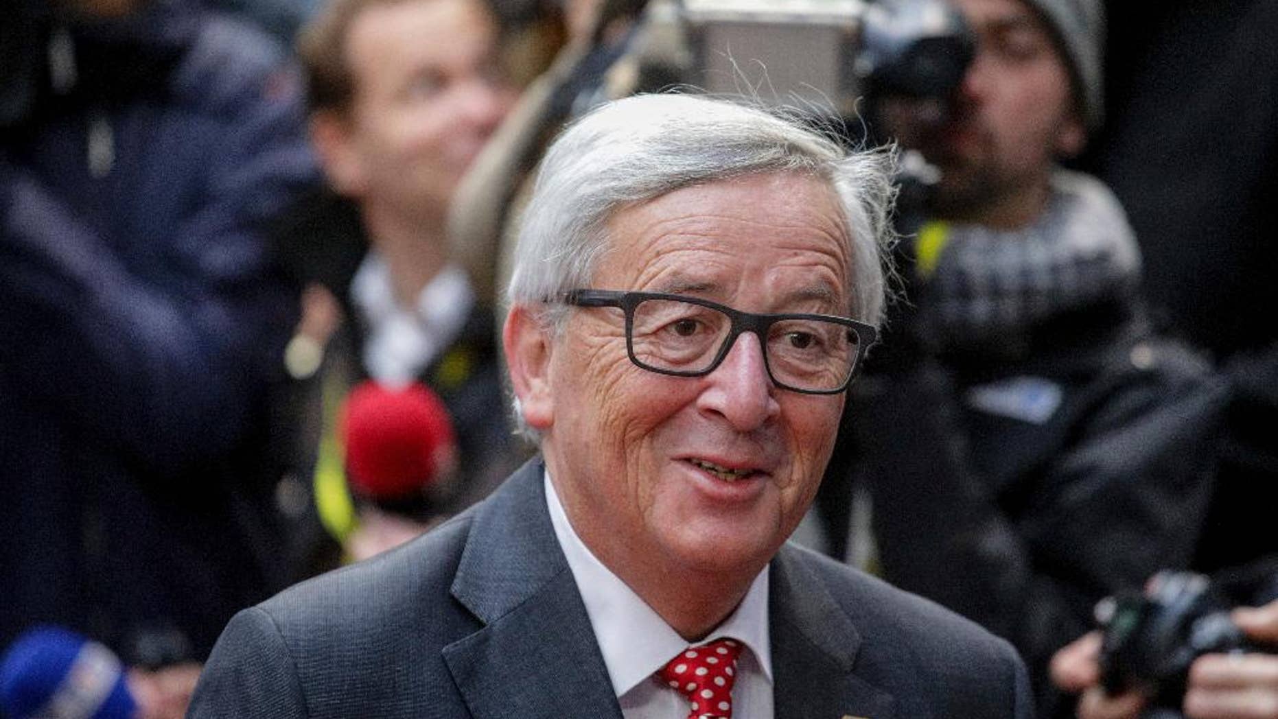 FILE- In this Friday, Oct. 21, 2016 file photo, European Commission President Jean-Claude Juncker arrives on the second day of the EU summit in Brussels. Juncker told German public radio Deutschlandfunk on Saturday, Feb. 11, 2017, he will not run for another term. (AP Photo/Olivier Matthys, File)
