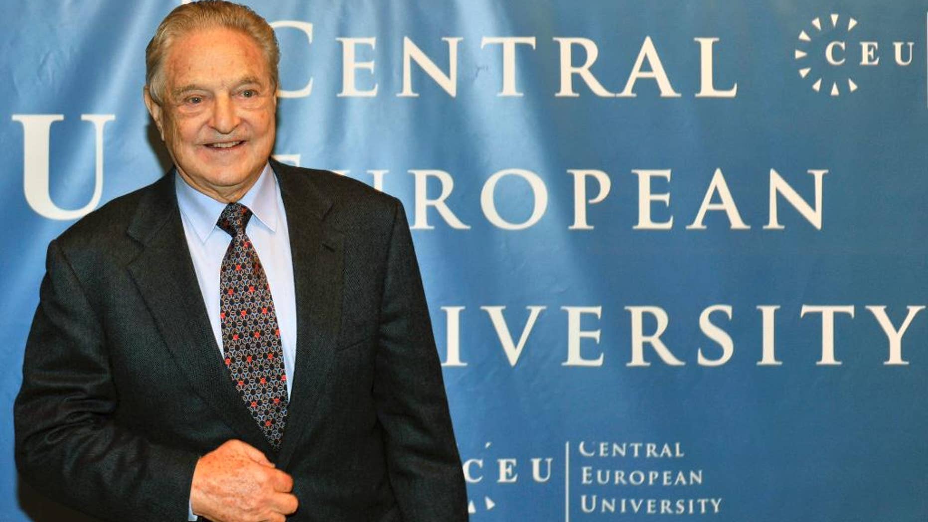FILE - In this Oct. 26, 2009 file photo Hungarian born US billionaire and investor George Soros is pictured ahead of the start of his five-day-long lecture at the Central European University, CEU, in Budapest, Hungary. Hungary's education secretary says the government supports the work in the country of a university founded by Soros, considered an ideological opponent by Prime Minister Viktor Orban. (AP Photo/Bela Szandelszky, file)