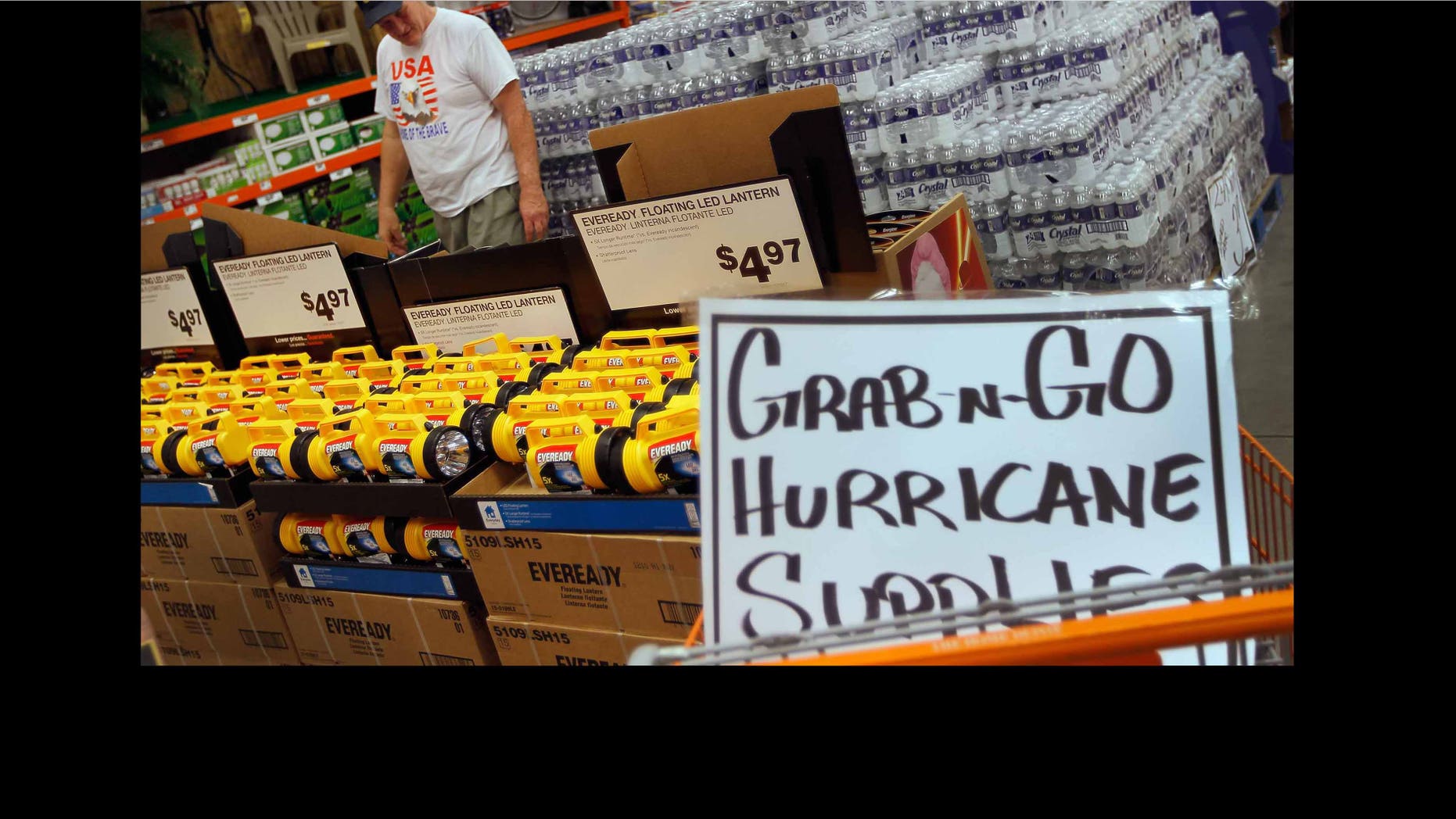 WEST PALM BEACH, FL - AUGUST 22: Jim Abel shops for hurricane supplies at Home Depot as he prepares for the possible arrival of Hurricane Irene on August 22, 2011 in West Palm Beach, Florida. Irene is the first Hurricane of the 2011 Atlantic season with winds at 80mph currently and may hit the East coast later this week with higher winds projected. (Photo by Joe Raedle/Getty Images)
