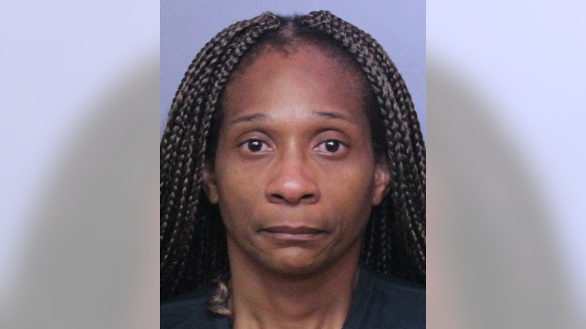 Shawkimo Anderson, 41, told deputies she sealed her dog, "Diamond," into a plastic bag and then into a garbage bin because she couldn't afford to take care of her. The dog later died.