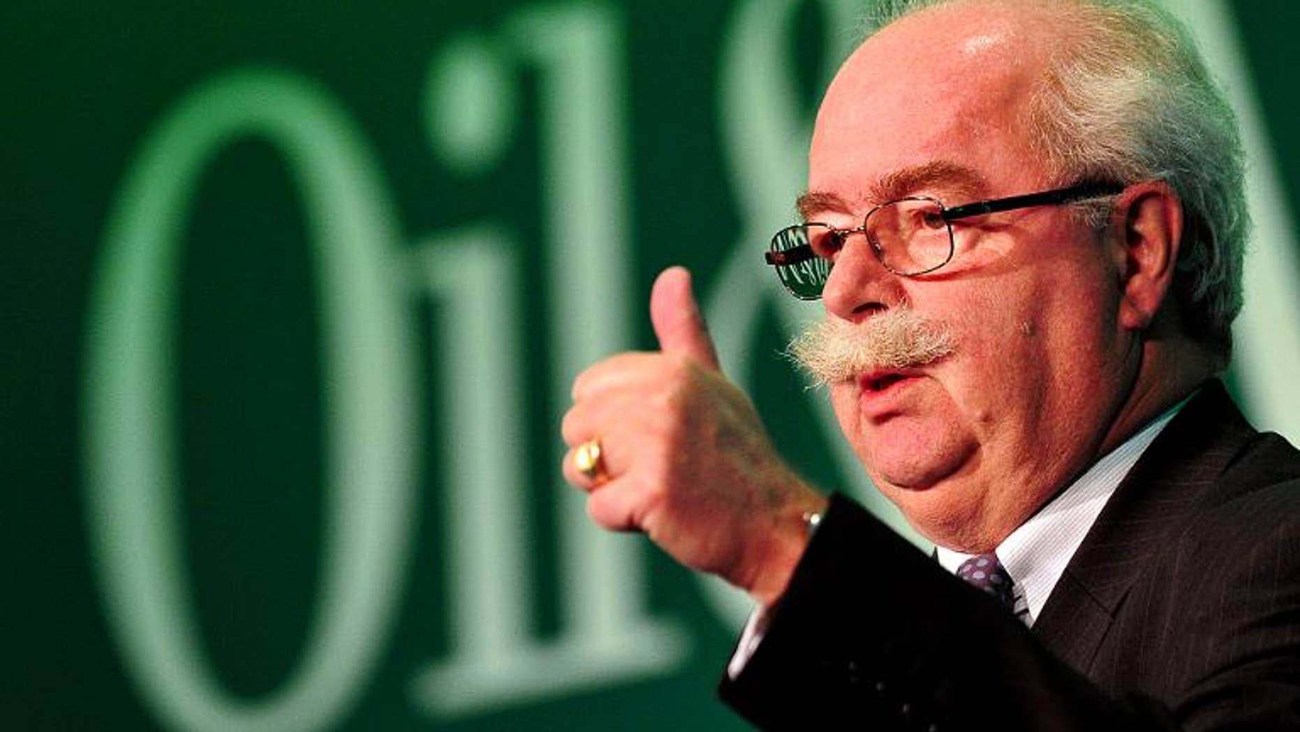 Christophe de Margerie, Chairman and Chief Executive Officer of Total, addresses delegates at the Oil and Money Conference in central London, on October 1, 2013