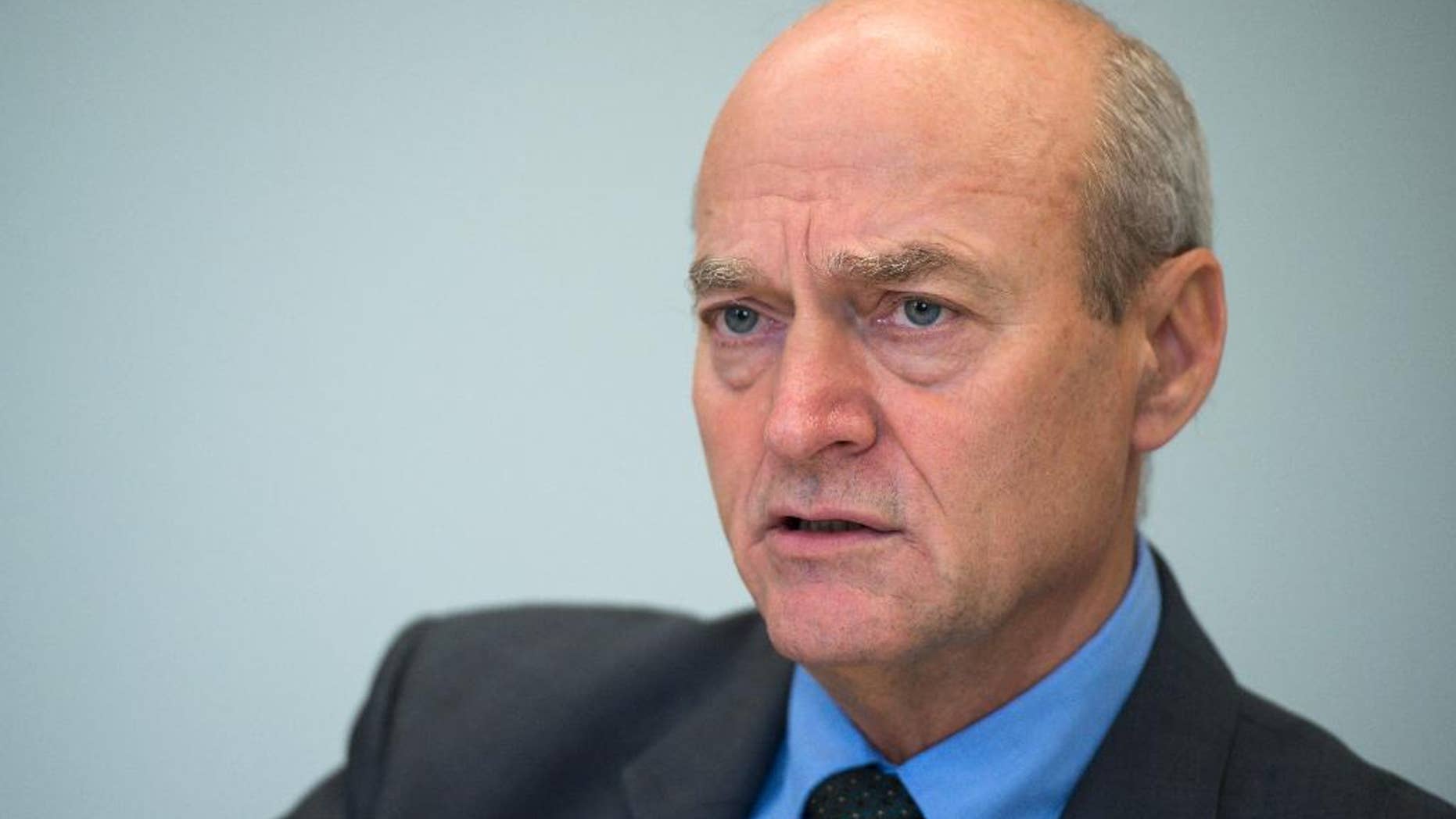 FILE - In this March 18, 2016 file photo head of the Bundesnachrichtendienst, or BND, Gerhard Schindler, speaks in Berlin, Germany. Schindler, who has led the BND since 2012 will step down July 1, Merkel's office said Wednesday, April 27, 2016. (Bernd von Jutrczenka/dpa via AP, file)