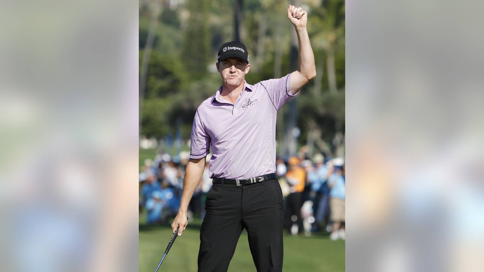 Jimmy Walker celebrates after winning the Sony Open golf tournament, Sunday, Jan. 18, 2015, in Honolulu. (AP Photo/Hugh Gentry)