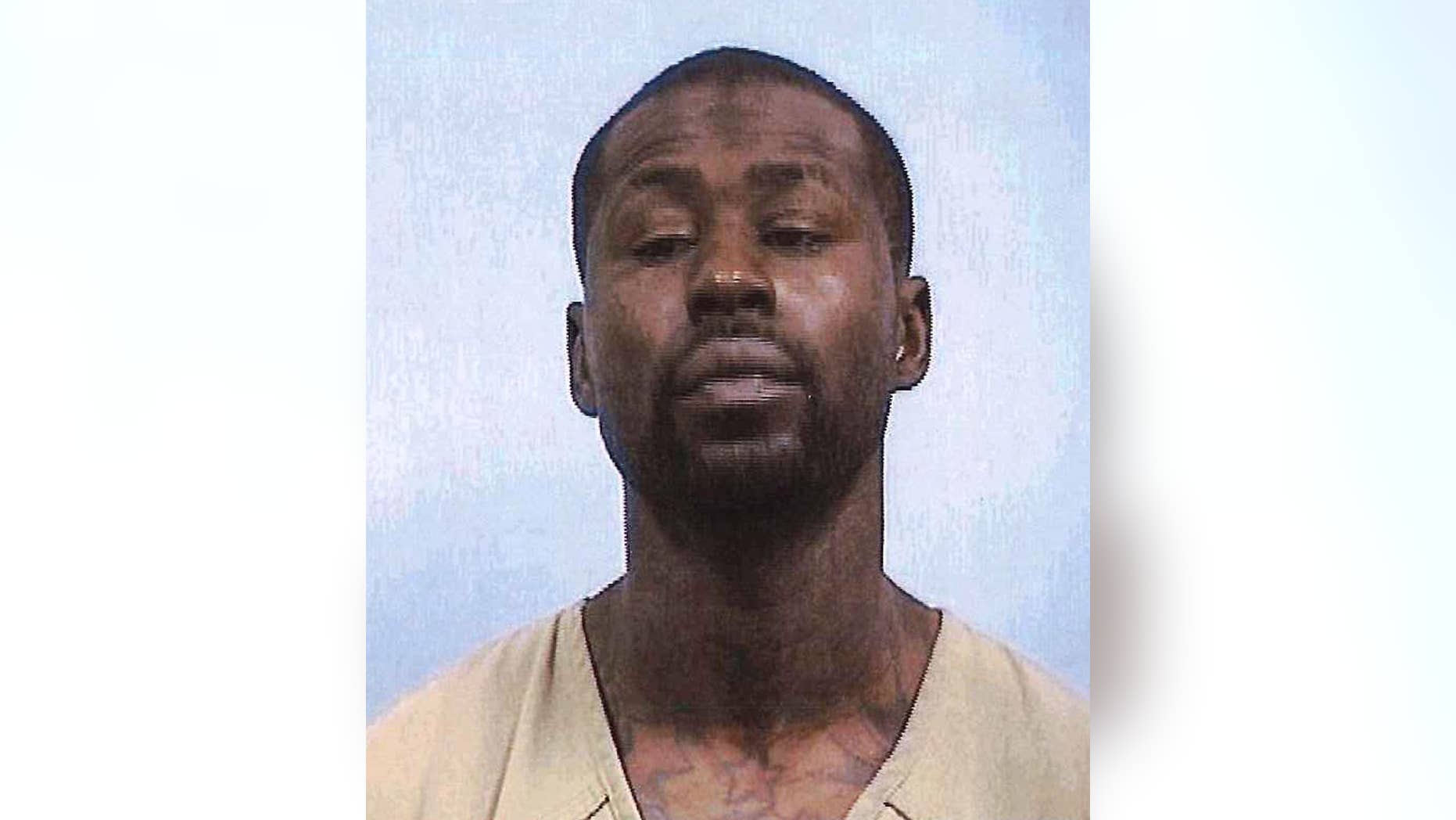 This undated photo provided by the Elkhart County Sheriff’s Department shows Derrick Glass, who is accused of holding four people hostage for five days in Elkhart, Ind. Glass was arrested Tuesday, May 2, 2017, after he allowed one of his alleged hostages to go shopping. (Elkhart County Sheriff’s Department via AP)