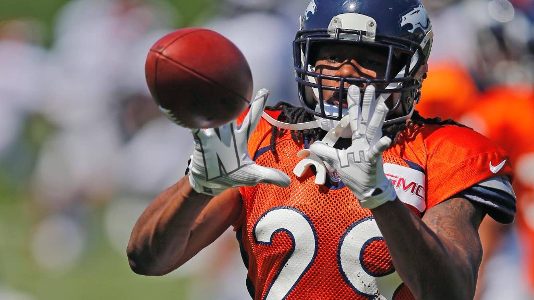 FILE - In this Thursday, Aug. 14, 2014 file photo, Denver Broncos' Bradley Roby runs a drill during NFL football training camp in Englewood, Colo. (AP Photo/Jack Dempsey, File)