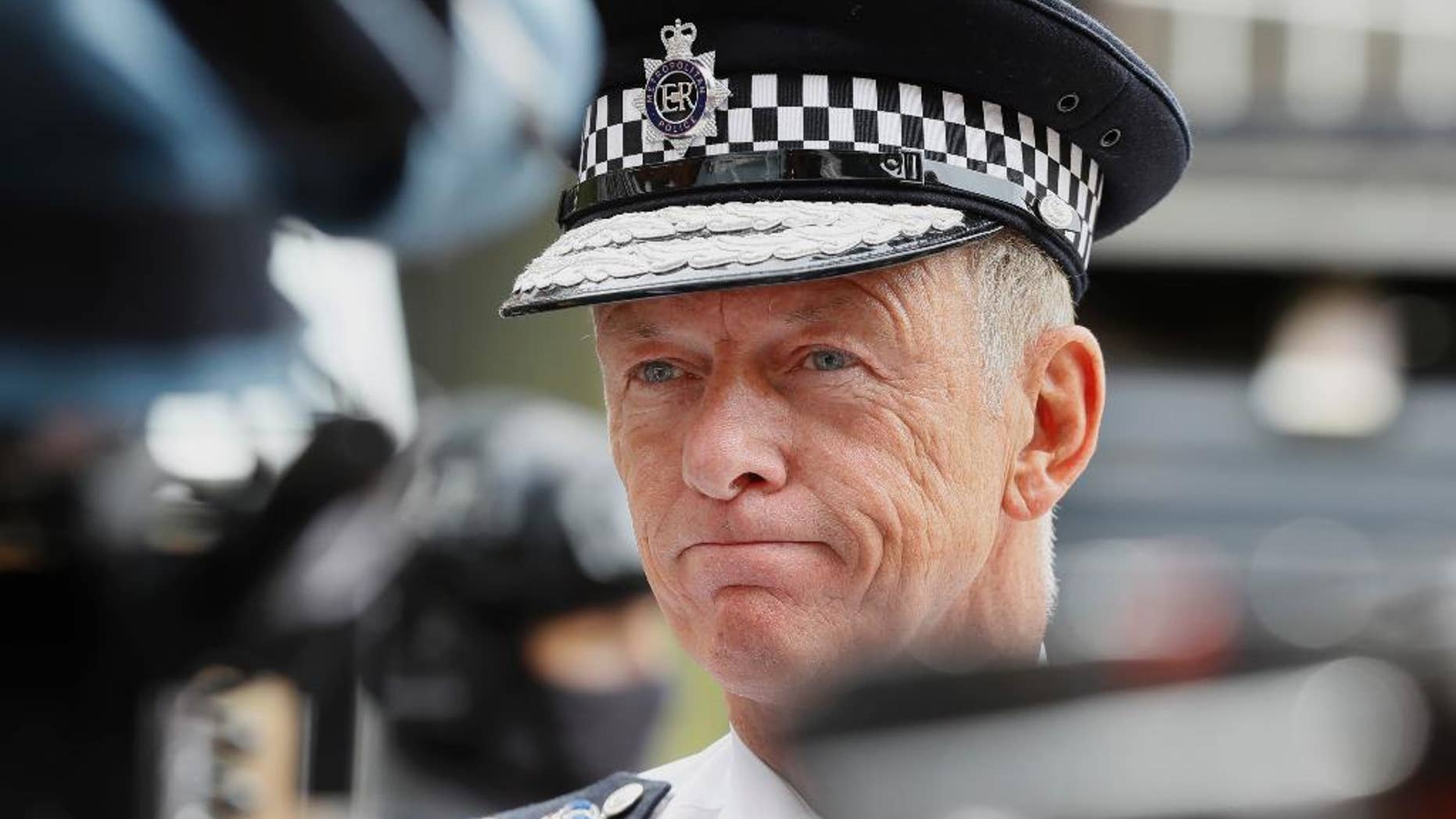 FILE - In this Wednesday, Aug. 3, 2016 file photo, Metropolitan Police chief Bernard Hogan-Howe is interviewed during a media opportunity in London. London’s police chief says he doesn't think Britain's exit from the European Union will hurt international cooperation against crime and terrorism. Hogan-Howe told journalists on Wednesday, Jan. 18, 2017 that Britain should be able to retain some form of association with the EU police organization, Europol, and "maintain similar arrangements" to the current EU-wide extradition warrant. (AP Photo/Kirsty Wigglesworth, File)