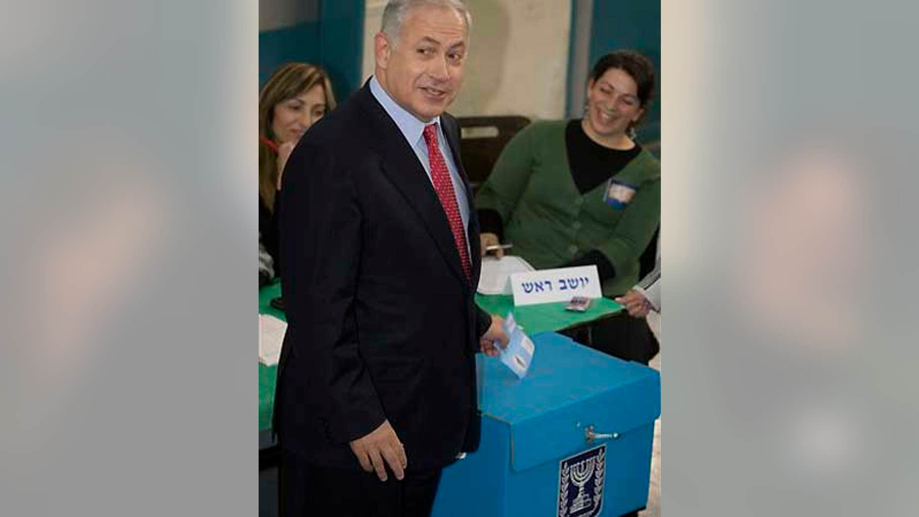 Feb. 10: Likud Party leader Benjamin Netanyahu casts his ballot in Israel's general election at a polling station in Jerusalem.