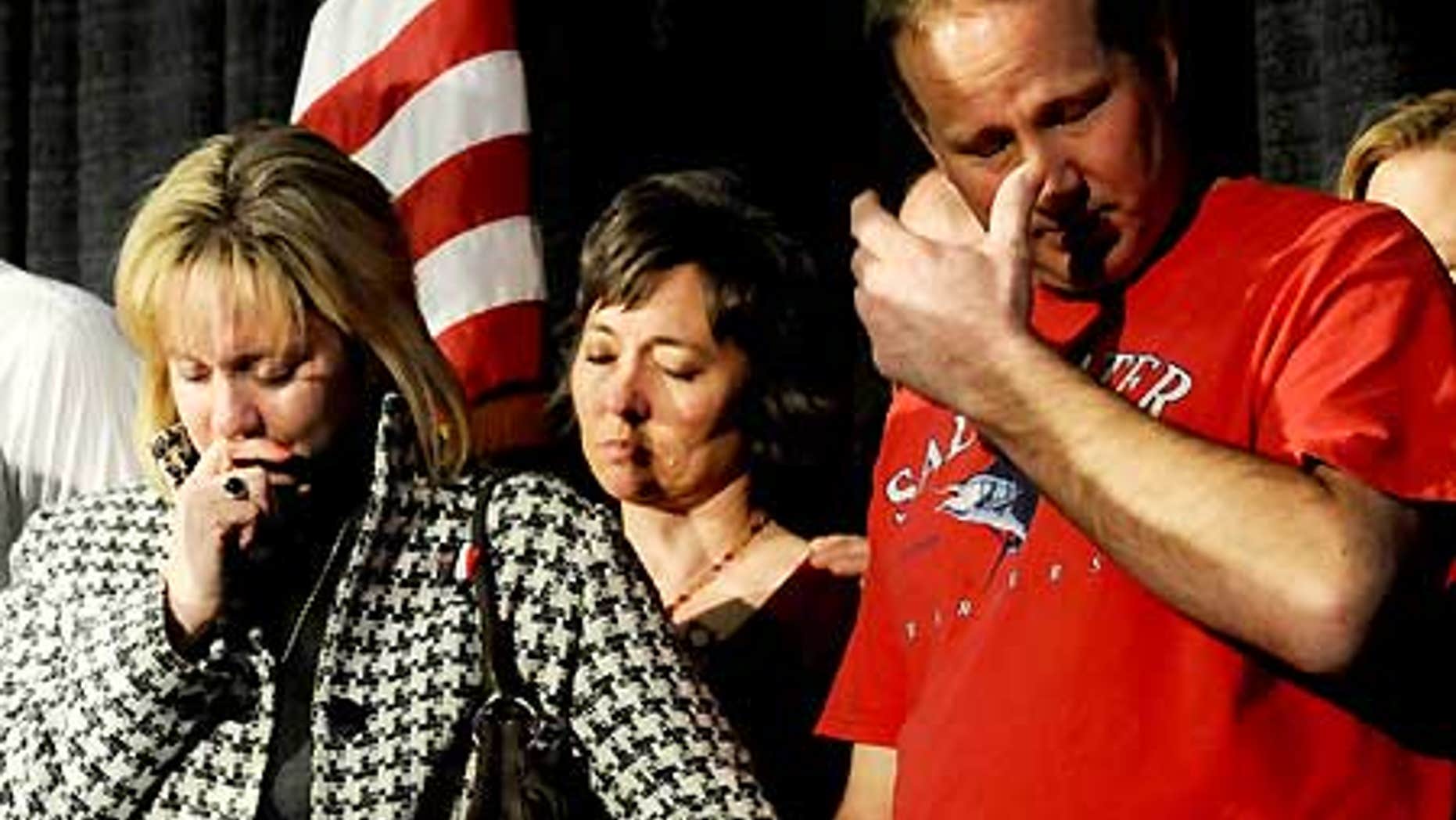 Feb. 18: Lisa Allen and her husband Jim Allen react during a welcome home rally at the Hospitality Room at the Amarillo Civic Center.