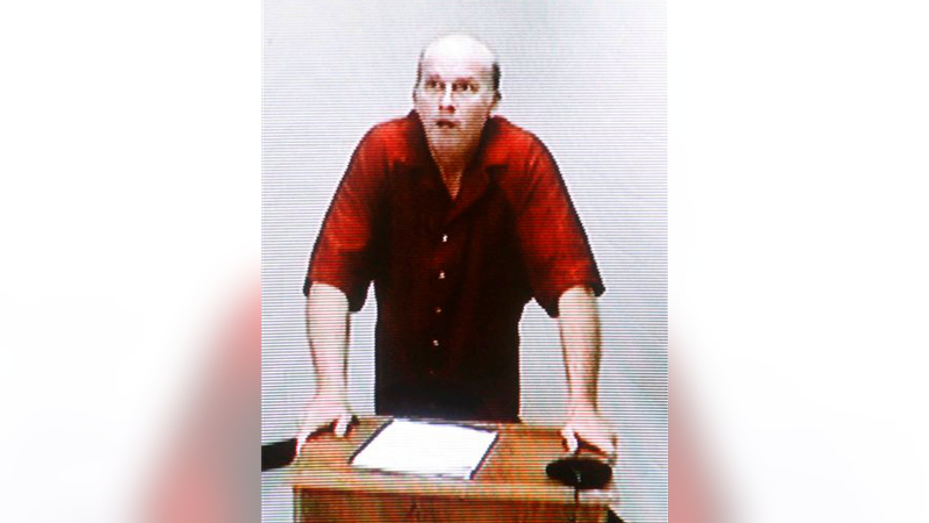 Scott Roeder, seen on June 2, 2009 in a court video from the Sedgwick County Jail in Wichita, Kansas, is in talks with a lawyer to potentially enter a justifiable homicide defense.