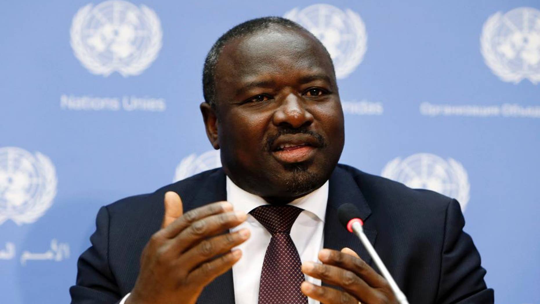 FILE - In This Sept. 27, 2013 file photo CTBTO Executive Secretary Lassina Zerbo speaks during a news conference regarding the Comprehensive Nuclear-Test-Ban Treaty Organization Article XIV conference during the 68th session of the United Nations General Assembly at U.N. headquarters. The head of the UN’s nuclear test ban treaty organization challenged Iran on Tuesday to ratify the treaty as quickly as possible to prove that it is serious about not wanting to develop atomic arms. (AP Photo/Jason DeCrow)