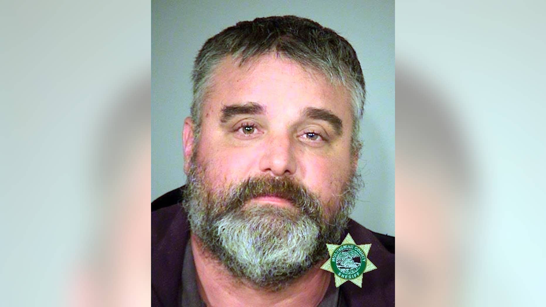 FILE - This Jan. 27, 2016 file photo provided by the Multnomah County Sheriff's Office shows Jason Patrick. Patrick, one of seven Oregon refuge standoff defendants awaiting trial, is asking the court to dismiss his indictment, arguing that statements by federal officials expressing disappointment after the acquittal of Ammon Bundy will taint his right to a fair trial. (Multnomah County Sheriff's Office via AP, file)
