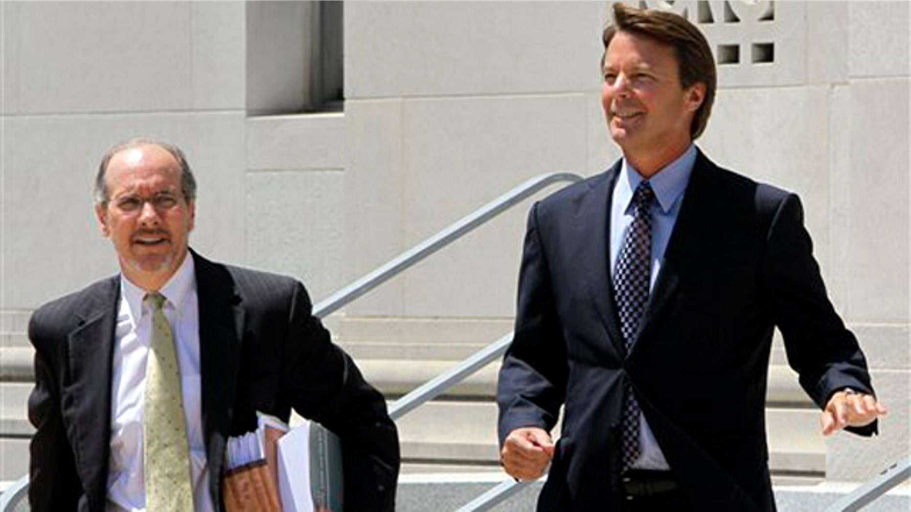 Former presidential candidate John Edwards, right, leaves federal court with attorney Jim Cooney following an appearance in Greensboro, N.C., Thursday, July 14, 2011.