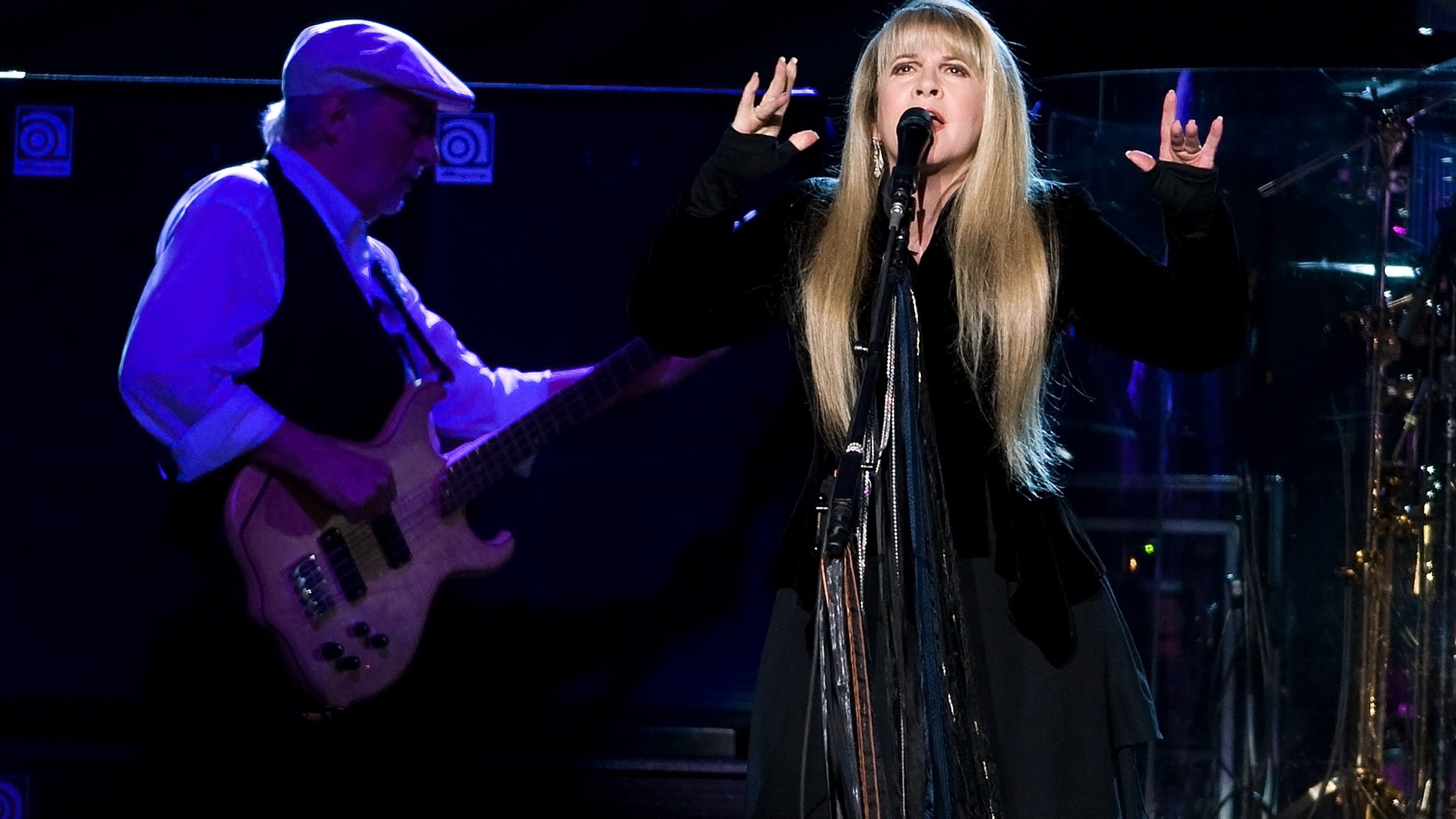 This March 19, 2009 file photo shows John McVie, left, and Stevie Nicks of Fleetwood Mac performing at Madison Square Garden in New York.