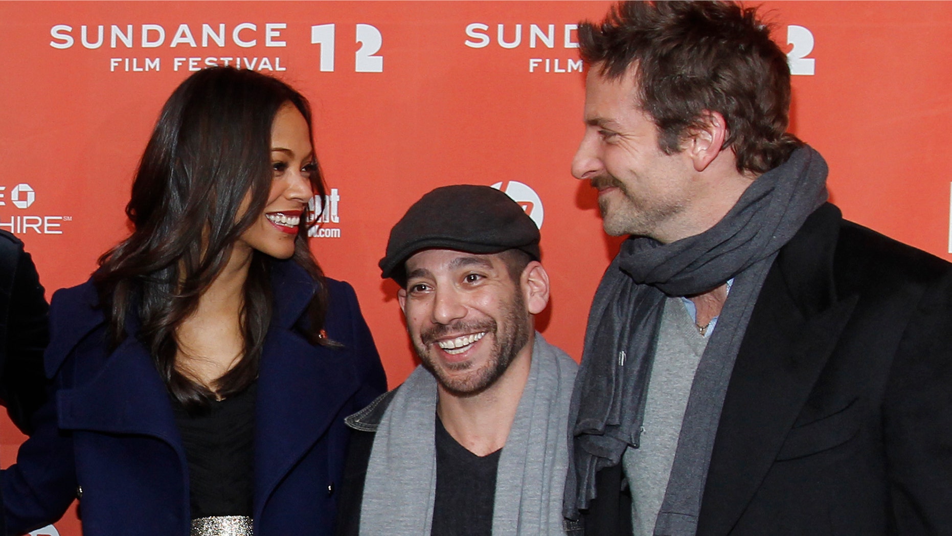 Actress Zoe Saldana, left, co-writer and co-director Lee Sternthal, center, and actor Bradley Cooper pose at the premiere of "The Words" during the 2012 Sundance Film Festival in Park City, Utah on Friday, Jan. 27, 2012. (AP Photo/Danny Moloshok)