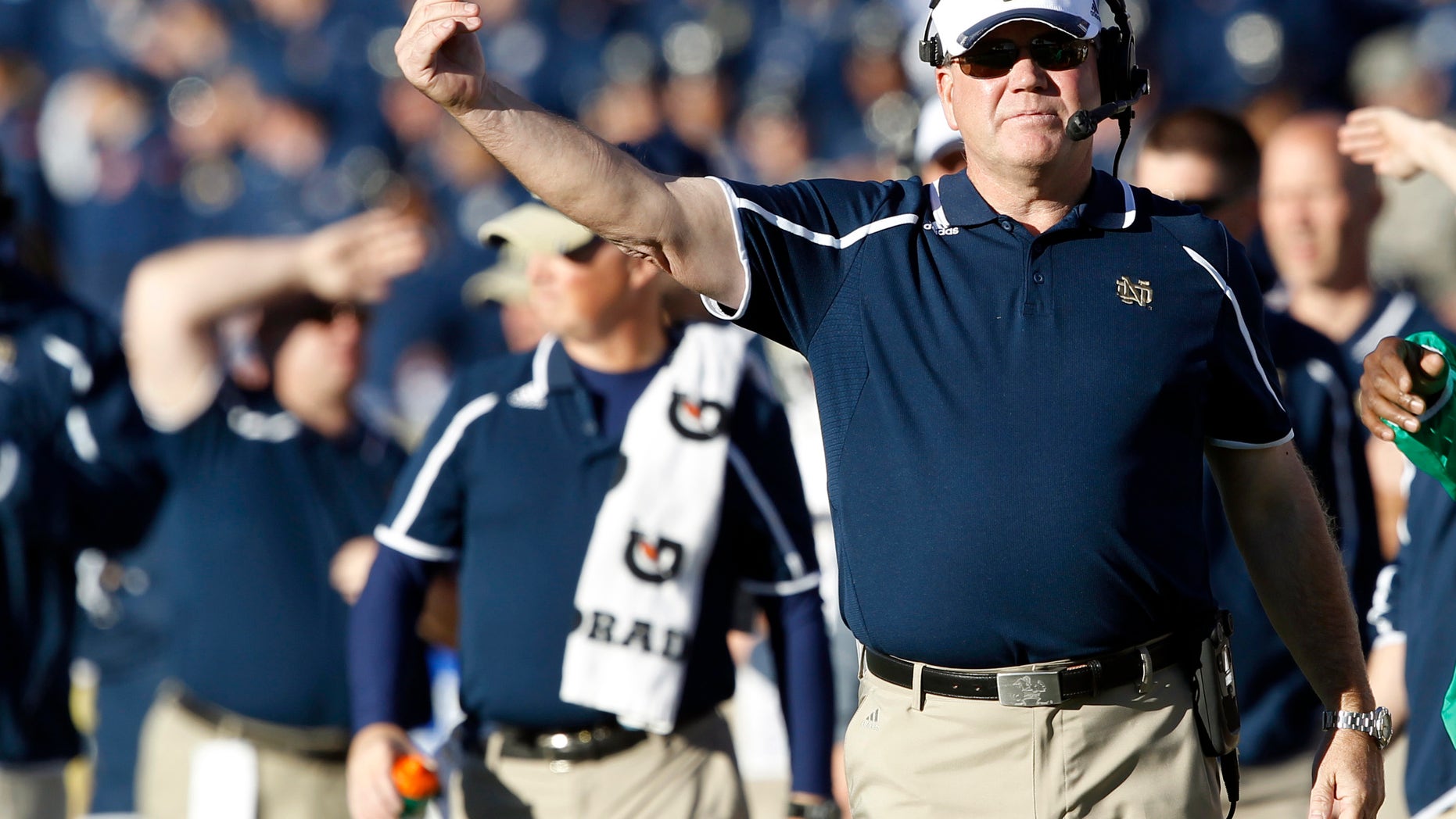 Notre Dame head coach Brian Kelly directs his team against Air Force in the second quarter of an NCAA college football game in Air Force Academy, Colo., Saturday, Oct. 26, 2013. (AP Photo/David Zalubowski)