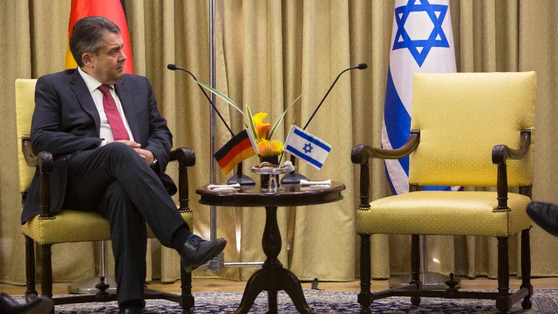 German Foreign Minister, Sigmar Gabriel looks on during his meeting with Israel's President, Reuven Rivlin at the President's residence in Jerusalem, Tuesday, April 25, 2017. Gabriel said Tuesday it would be "regrettable" if Israeli Prime Minister Benjamin Netanyahu cancels their planned talks in Jerusalem because of his meeting with groups critical of Israel's actions in the West Bank, but downplayed the spat. (AP Photo/Sebastian Scheiner)
