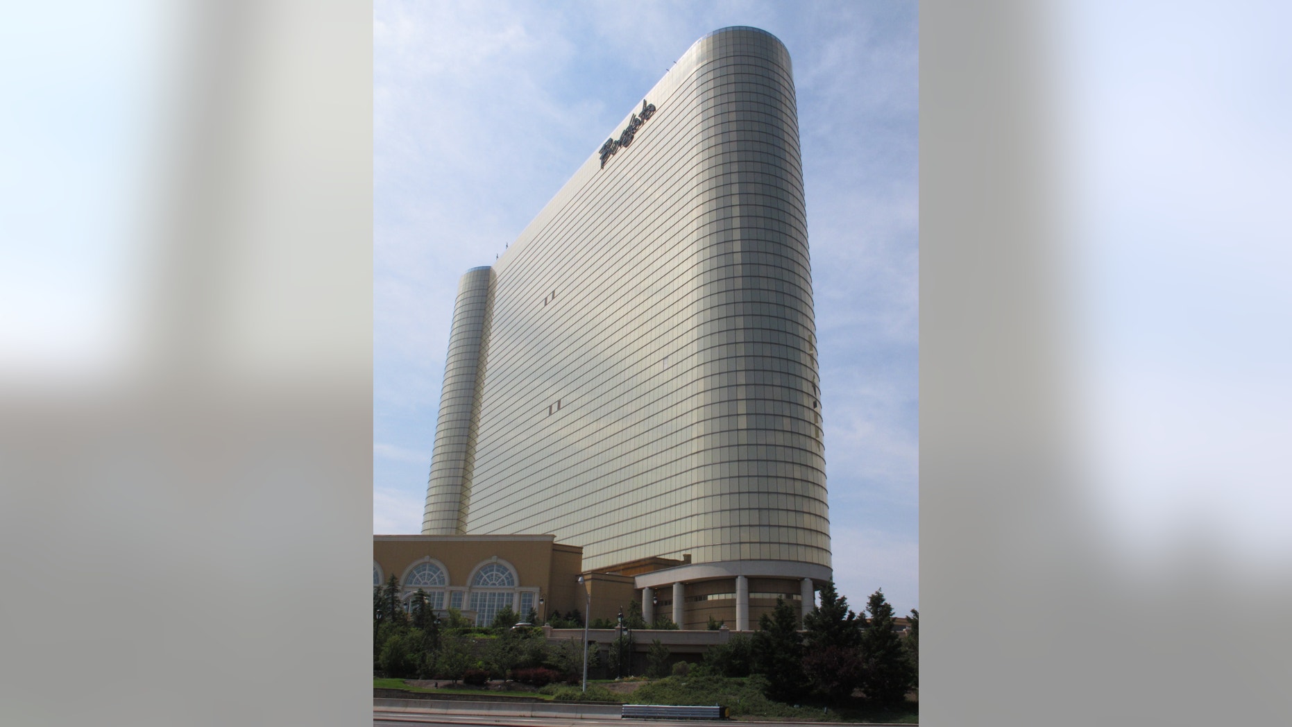 FILE - This June 26, 2013 file photo shows the Borgata Hotel Casino & Spa in Atlantic City, N.J. The casino and state gambling regulators suspended a poker tournament at the Borgata on Jan. 17, 2014 amid an investigation into whether someone used counterfeit gambling chips. (AP Photo/Wayne Parry)