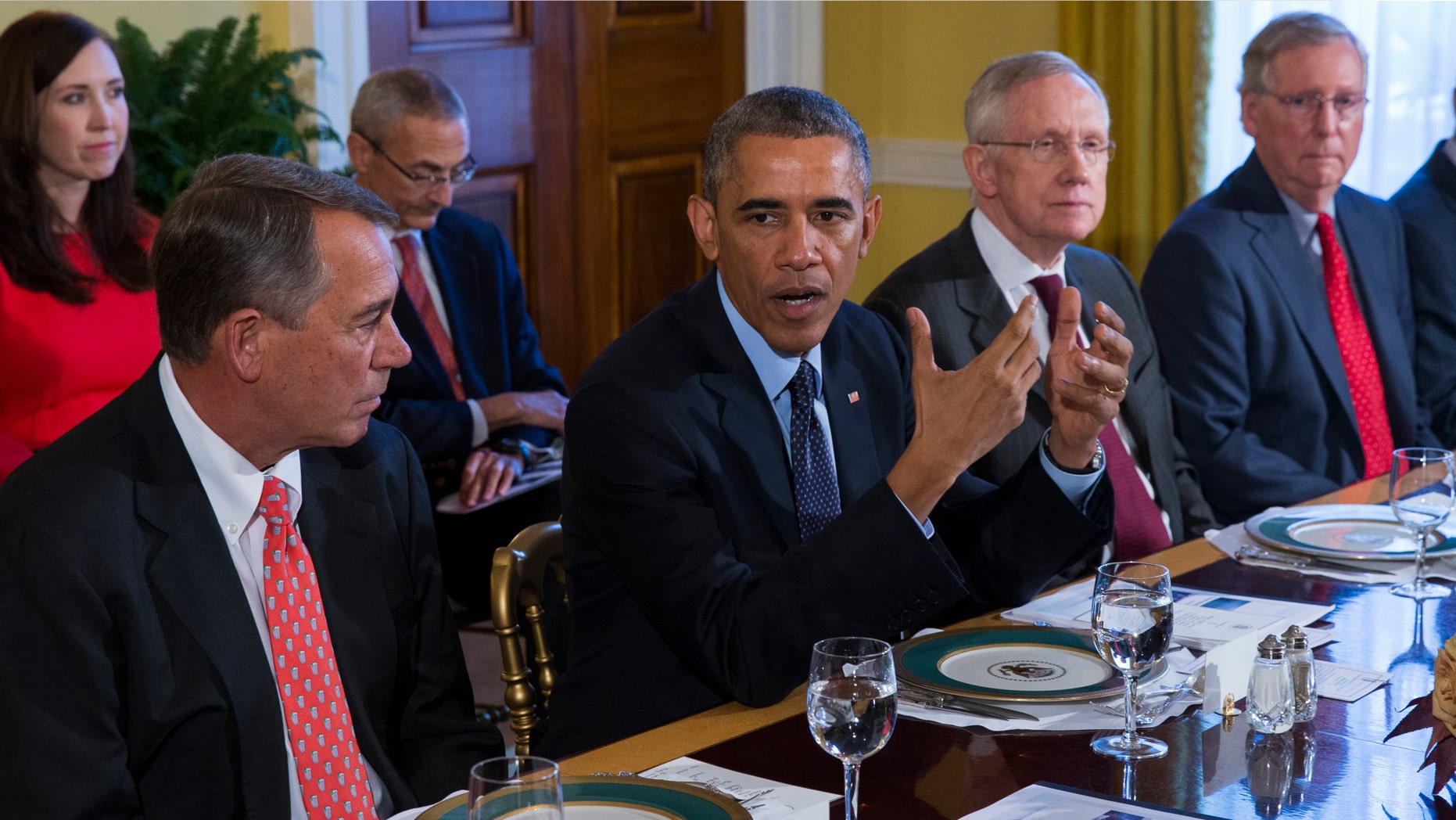 President Barack Obama meets with Congressional leaders in the Old Family Dining Room of the White House in Washington, Friday, Nov. 7, 2014. From left are, House Speaker John Boehner of Ohio, Obama, Senate Majority Leader Harry Reid of Nev., and Senate Minority Leader Mitch McConnell of Ky. (AP Photo/Evan Vucci)