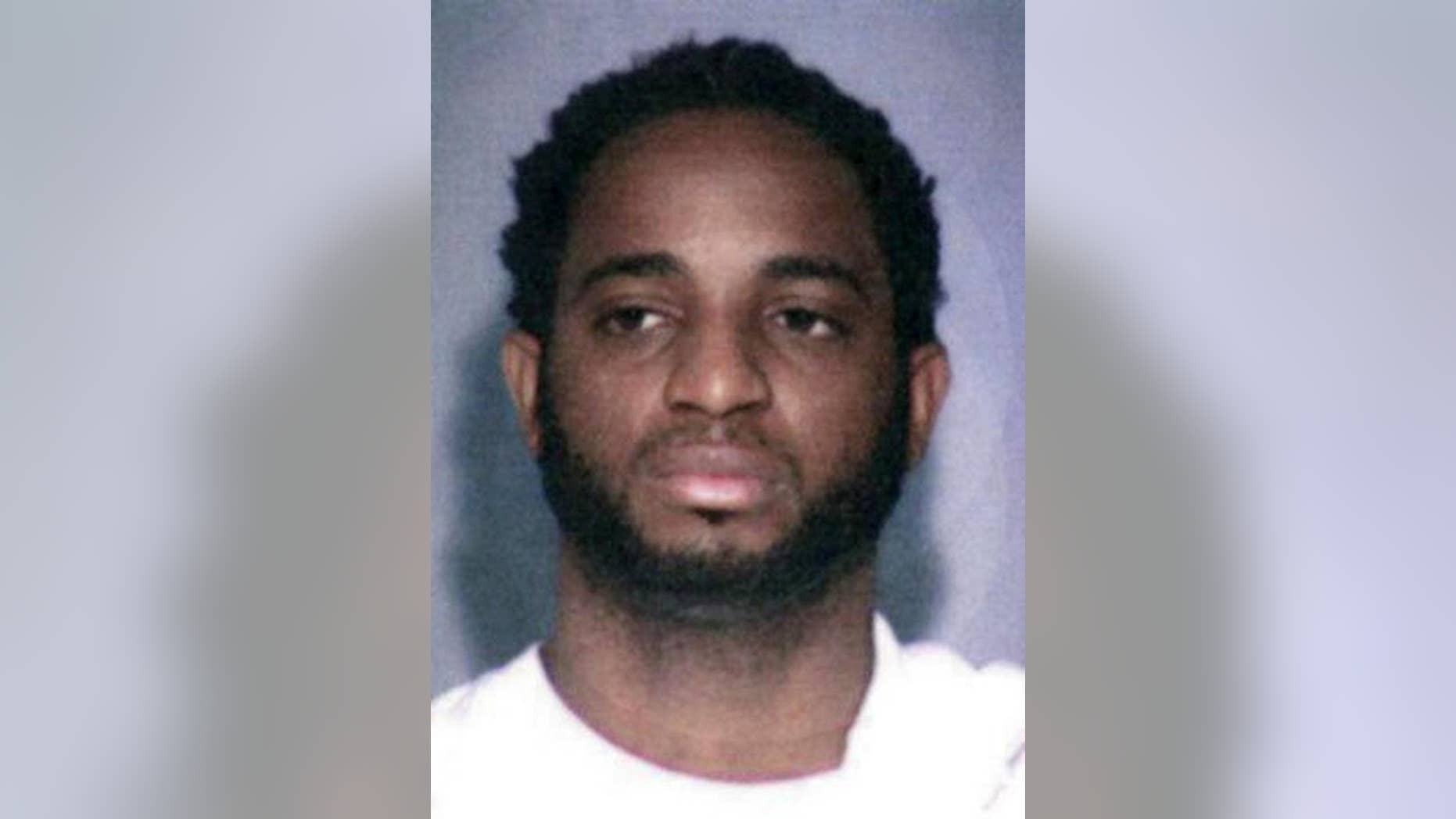 This undated photo provided by the FBI shows fugitive Marlon Jones who is wanted for multiple counts of murder in Los Angeles. The FBI has added Jones, a Jamaican fugitive to its most-wanted list as a suspect in the slaying of four people at a Los Angeles birthday party in October. The FBI announced a reward on Thursday, Dec. 1, 2016 of up to $100,000 for information leading to the arrest of Jones who should be "considered armed and extremely dangerous." (FBI via AP)